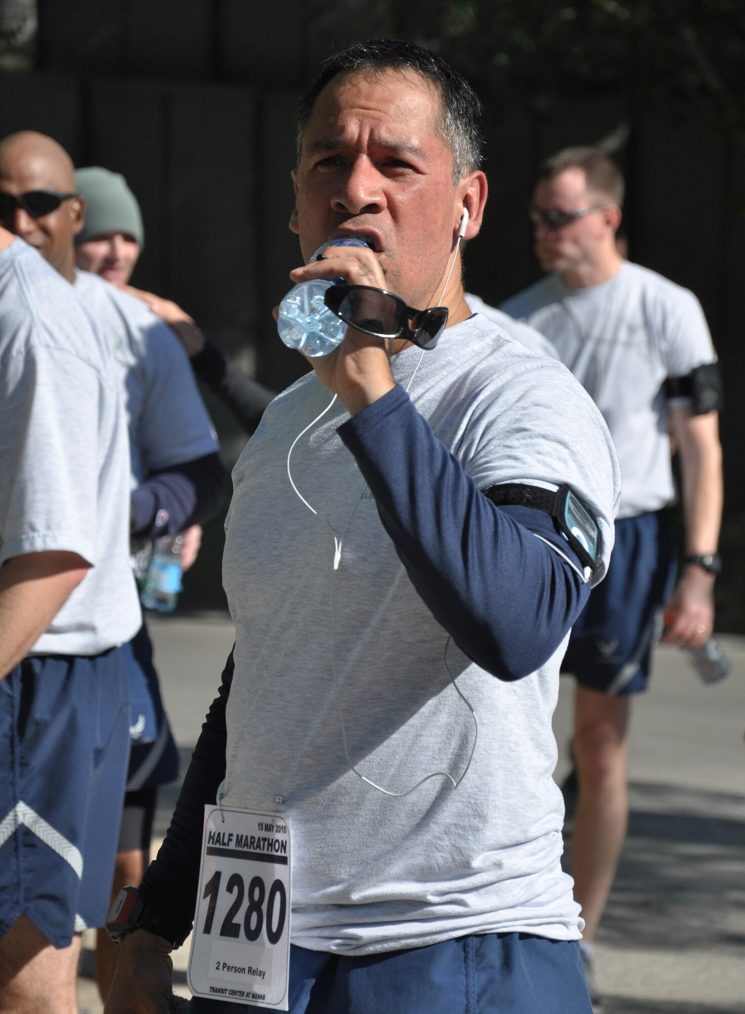The 376th Expeditionary Force Support Squadron organized a half marathon May 15, 2010, for the Transit Center at Manas, Kyrgyzstan. Several runners relayed, each taking half the run; others finished the full 13.1 miles along a course which bordered the flight line, coming in toward the finish with crowds cheering them on. Airmen, Soldiers, Sailors, Marines, contractors, and Defense Department civilians assigned and transiting through Manas all participated. (U.S. Air Force photo/Staff Sgt. Carolyn Viss)