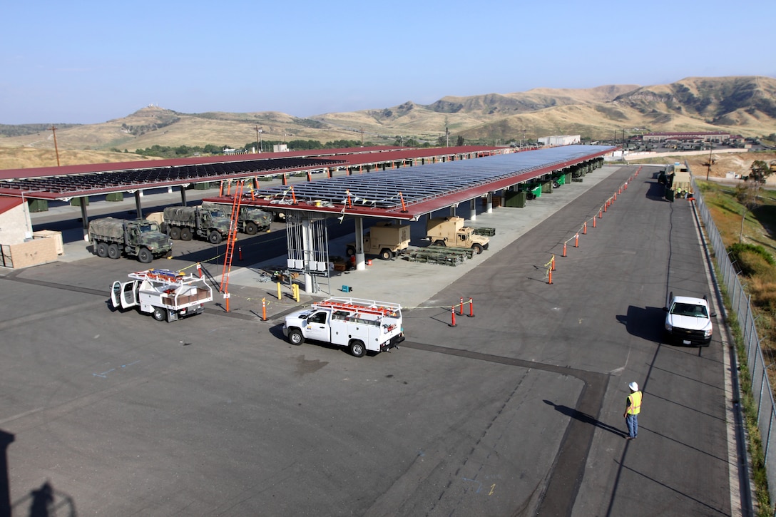 Solar panel installation at a Las Pulgas artillery shelter nears completion as contracted workers finish setting up 672 modules at Camp Pendleton. The artillery shelter’s solar panel project was only a portion of a larger $2.9 million base efficiency effort that has created more than 50 jobs for local residents. The overall energy-saving effort also includes a smaller solar array on top of the 22-Area recycling center and several lighting improvements in Camp Horno.