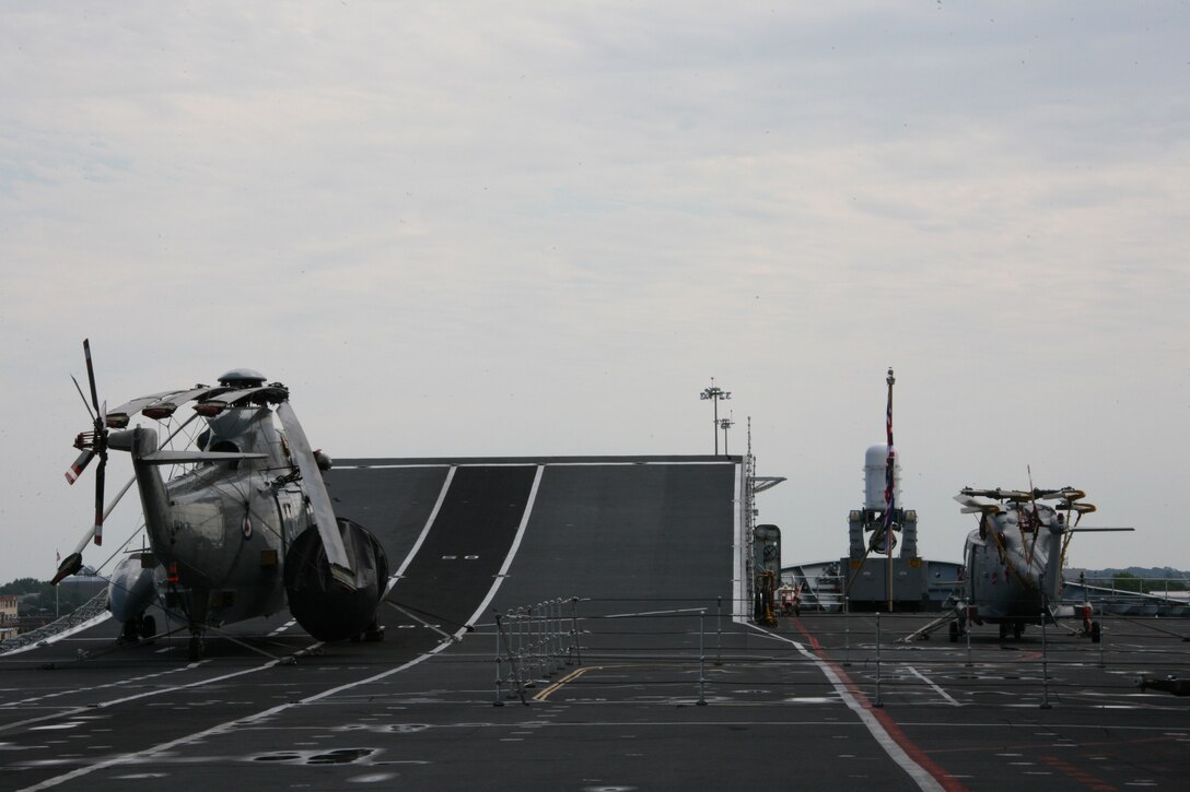 A British aircraft sits on the flight deck of the HMS Ark Royal, a British Royal Navy aircraft carrier, May 16. More than 100 Marines of Marine Attack Squadrons 223 and 542 are embarked on the ship to conduct Capella Strike, a two week multinational training exercise with British counterparts.