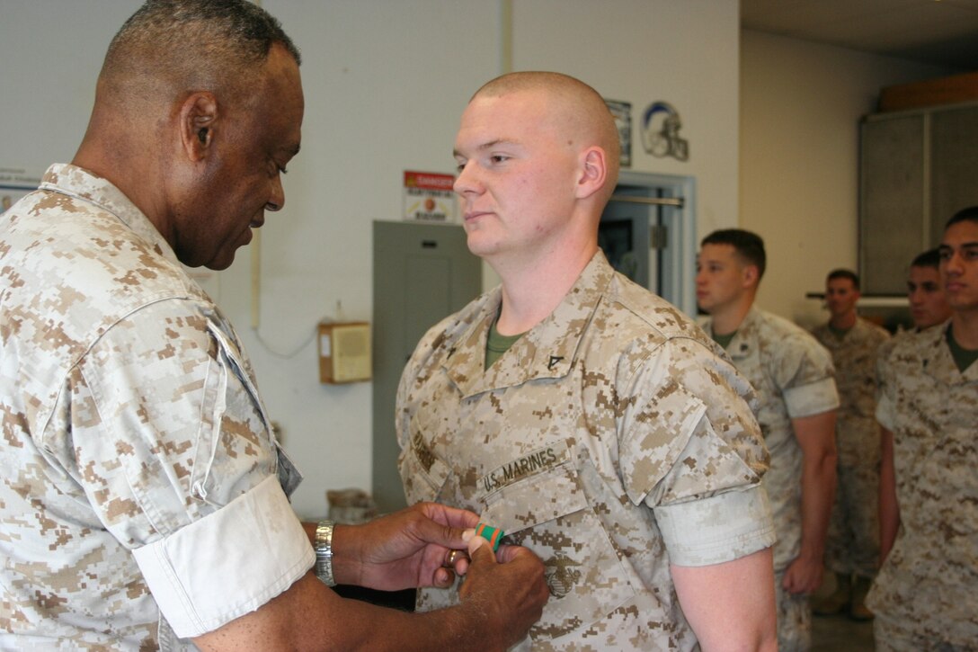 Lance Corporal Jonathan D. Raybon, Ground Electronics Maintenance Division, Headquarters and Headquarters Squadron, Marine Corps Air Station, Camp Pendleton is awarded the Navy and Marine Corps Achievement Medal.