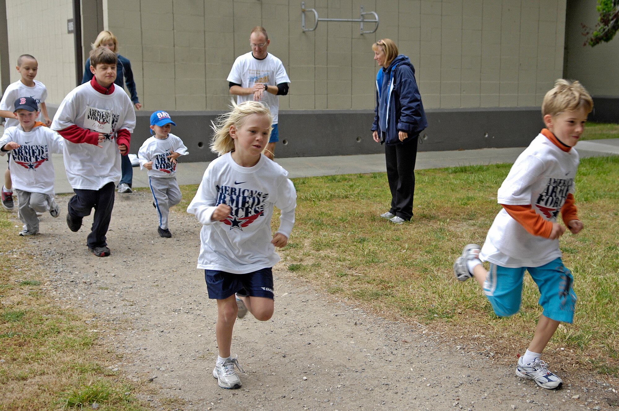 VANDENBERG AIR FORCE BASE, Calif. -- Children of Team V members compete during the Armed Forces Kids Run at the base trail here Saturday, May 15, 2010. Patrick Ovesen, son of Senior Master Sgt. David Ovesen, from the 30th Space Communications Squadron, won first place in the race. (U.S. Air Force photo/Airman 1st Class Andrew Lee))