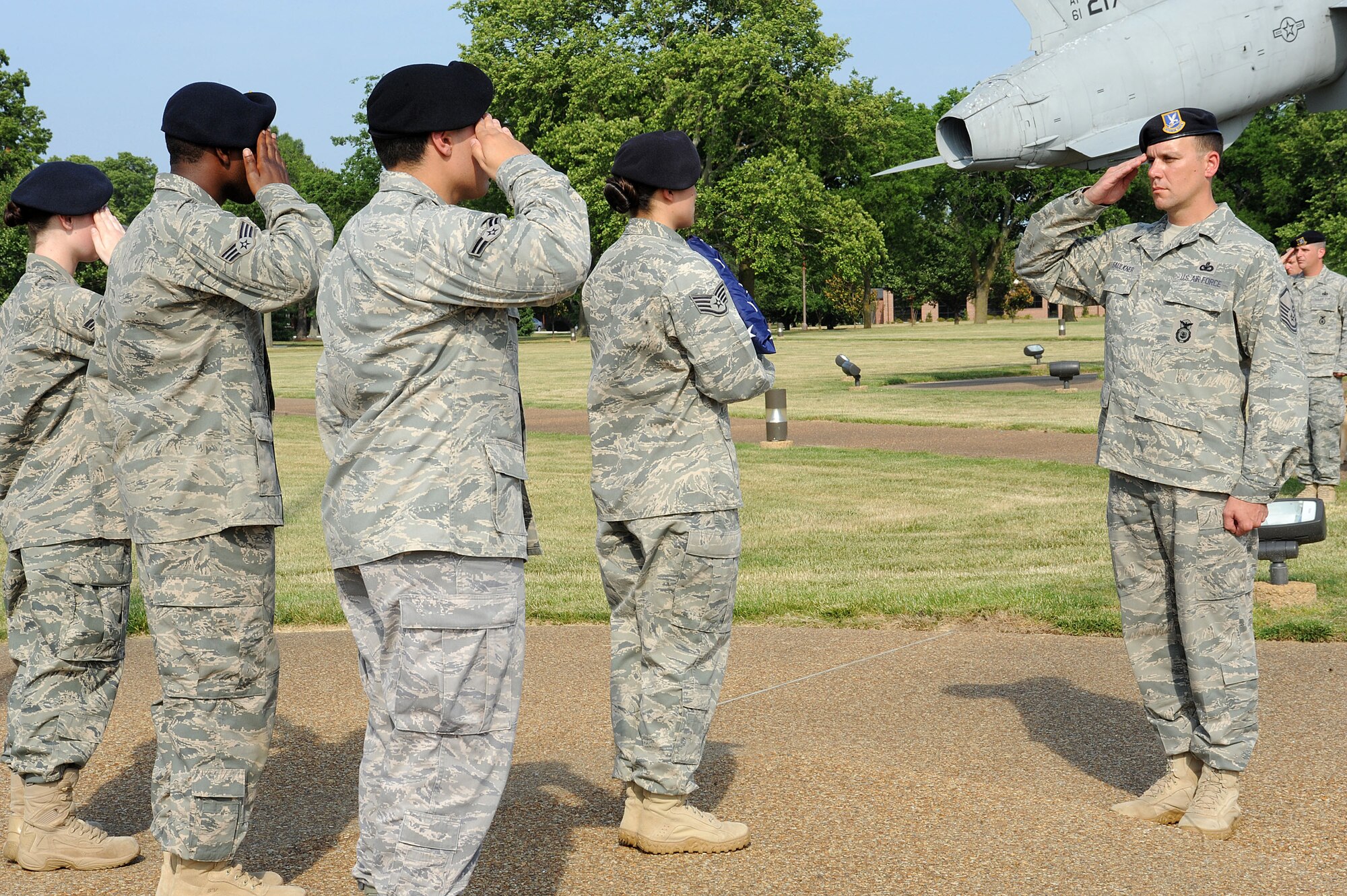 LANGLEY AIR FORCE BASE, Va. -- Master Sgt. Matthew Faulkner, 633d Security Forces Squadron, salutes the flag during a formal retreat ceremony honoring National Police Week May 14. Police Week is held annually to honor police officers, military and civilian, who have lost their lives in the line of duty. (U.S. Air Force Photo/Staff Sgt. Christina M. Styer) 