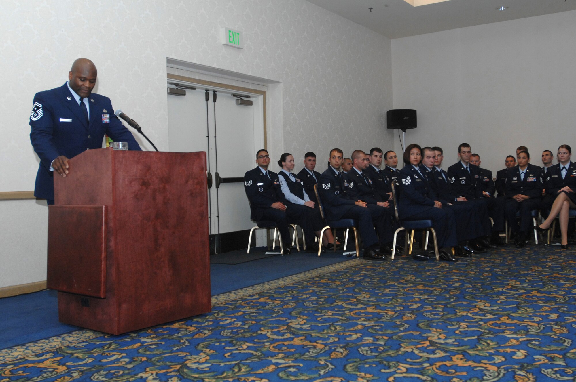 VANDENBERG AIR FORCE BASE, Calif. -- Senior Master Sgt. Jeffrey James, the 30th Civil Engineer Squadron first sergeant, offers words of wisdom to 70 Airmen who recently received a degree from the Community College of the Air Force here Friday, May 14, 2010.  The 30th Force Support Squadron education services office and the First Sergeants' Council organized the event. (U.S. Air Force photo/Senior Airman Christopher Hubenthal)
