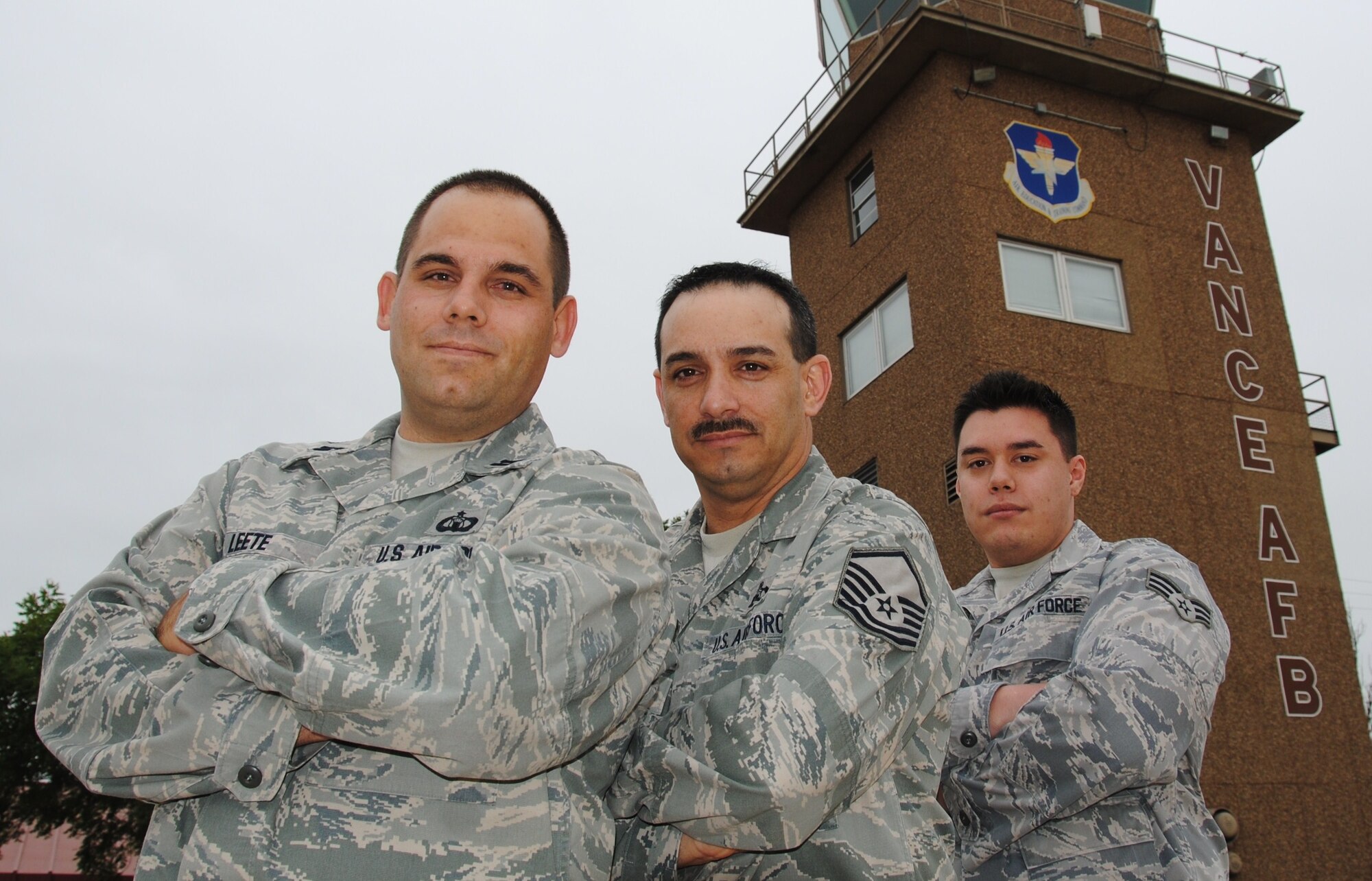 From left to right: Capt. Joshua Leete, commander of the Airfield Operations Flight, Master Sgt. James Mull, chief controller 71st Operations Support Squadron air traffic control tower  and Senior Airman Brandon Reyes, 71st Operations Support Squadron radar approach control. The three are winners of 2009 Air Force Airfield Operations awards. (U.S. Air Force photo/ Ensign Rex Miller)