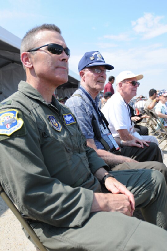 JOINT BASE ANDREWS, Md. -- Colonel William T. Cahoon (far left), 459th Air Refueling Wing commander, visits with veterans and residents of the Washington, D.C. campus of the Armed Forces Retirement Home during the Joint Service Open House, here, May 14. The Armed Forces veterans and retirees attended the JSOH and witnessed aerial performances including the Navy Blue Angels and saw static displays, including the Memhpis Belle, a World War II era B-17F Flying Fortress. (U.S. Air Force photo/Staff Sgt. Steve Lewis)