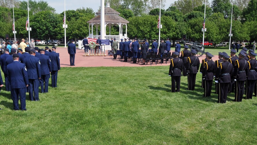 OFFUTT AIR FORCE BASE, Neb. -- Law enforcement officers from across the Omaha metro area join numerous members of the 55th Security Forces Squadron at the parade grounds here May 14 to honor all law enforcement officers during Offutt's Police Week Retreat Ceremony. The event honored the eight security forces Airmen who died while supporting Operation Iraqi Freedom, as well as Zorro, a military working dog who recently passed away. U.S. Air Force Photo by Jeff W. Gates. 