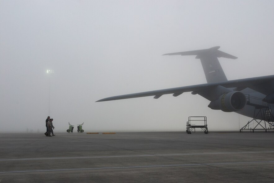 Members of the 433rd Airlift Wing, Lackland Air Force Base, Texas, walk the flightline in a Monday morning ritual searching for foreign object debris. Everyone from Col. Kenneth Lewis, wing commander,  to the brand new airman basics participate. The FOD is collected in a bag and properly disposed of. The wing vice commander Col. Dale Andrews, hides a gold-painted bolt somewhere to be found as incentive to be thorough during the FOD walk. Whomever finds the golden bolt wins their 15 minutes of fame and thanks from the roaring jet engines. (U.S. Air Force photo Airman 1st Class Brian McGloin)