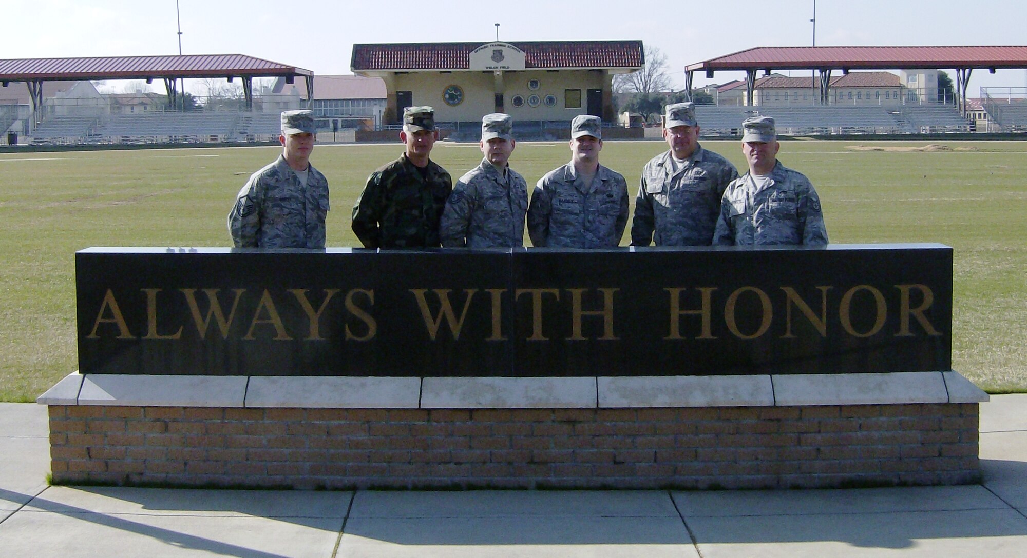 Members of the 336th Recruiting Squadron visited the Basic Officer Training course at Holmes Center, Maxwell Air Force Base, Ala., in March. The line officer recruiters received a tour and had the opportunity to witness officer trainees participating in various phases of the BOT course. The tour provided them insight into the training process so they could better prepare their officer applicants for training. Pictured left to right are:  Master Sgt. Tyler Cooley, Master Sgt. Christopher Conaway, Tech. Sgt. Michael Johnson, Staff Sgt. Travis Haynes, Master Sgt. Robert Dixon and Tech. Sgt. Grady Burnette. (courtesy photo)