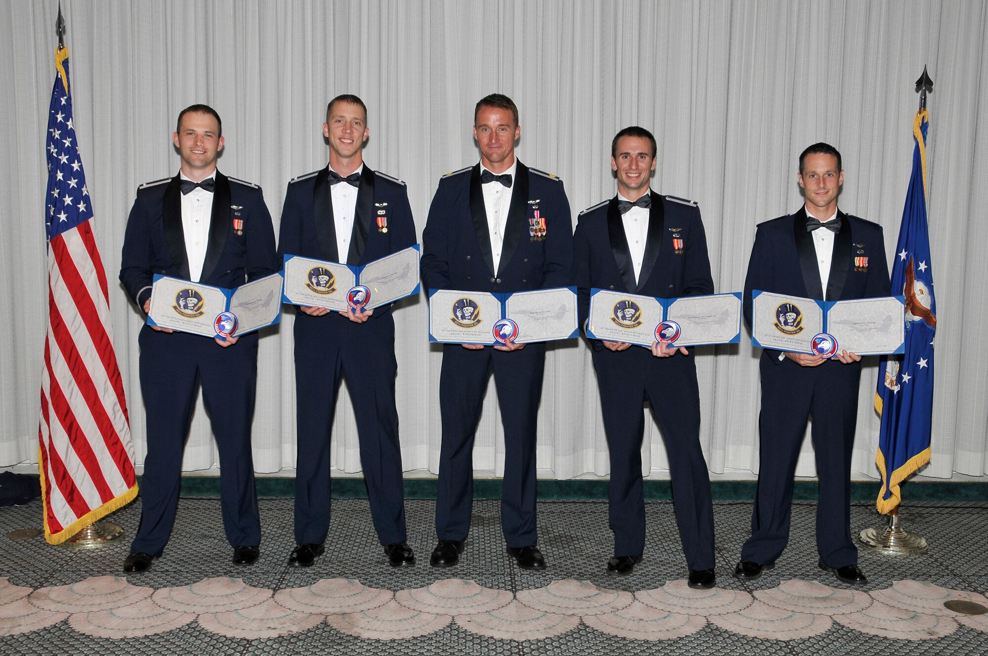 (from left to right) 1st Lt. Aaron Ewing, 1st Lt. Aaron Stevens, Maj. Skylar Clark, 1st Lt. Terry Fregly and Capt. Joel Thesing made up the final B-course graduation class from Tyndall Air Force Base May 14 at the Heritage Club. (U.S. Air Force photo by Lisa Norman)