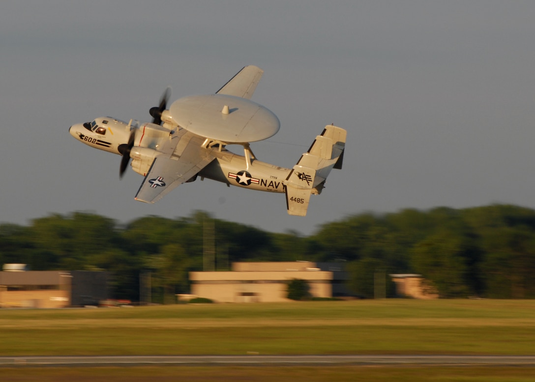 JOINT BASE ANDREWS, Md. -- With the completion of the Joint Service Open House, an E-2C Hawkeye, assigned to Airborne Early Warning Squadron (VAW) 77, the "Nightwolves", quickly takes off from Joint Base Andrews Naval Air Facility, Washington, D.C.  This is the first Joint Service Open House conducted by Team Andrews members at the newly minted Joint Base Andrews, continuing a rich tradition of partnership and strength rooted in service to the nation.  (U.S. Navy photo by Mass Communication Specialist 2nd Class Clifford L. H. Davis)