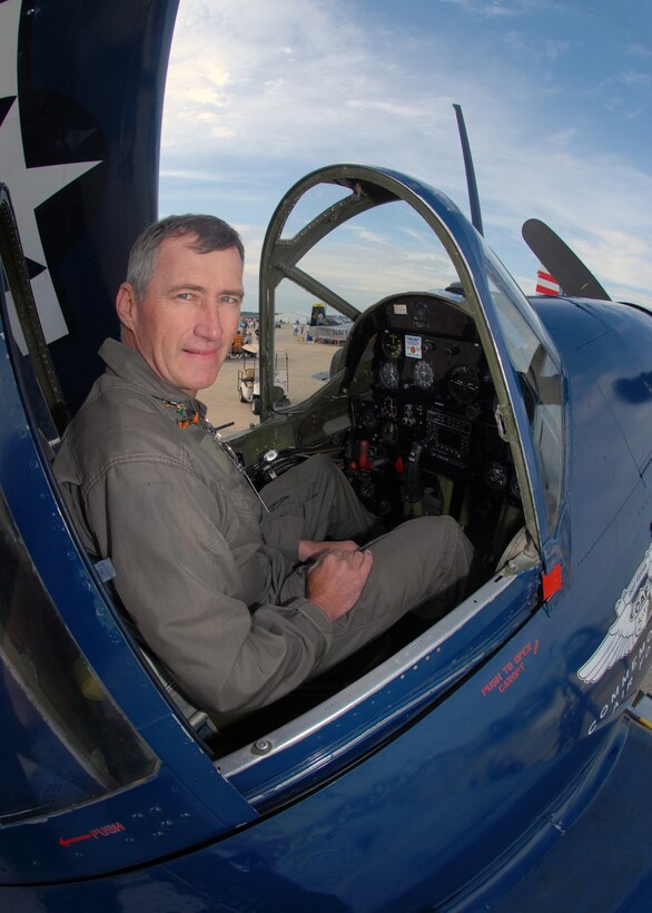 JOINT BASE ANDREWS, Md. -- Mr. Mark Allen, from Houston, TX., sits in the cockpit of the last flying example of a Navy Curtis-Wright SB2C Helldiver in the world, as he prepares the aircraft for visitors to the Joint Service Open House.  The aircraft, owned by the Commemorative Air Force, flies around the U.S. to promote the history of this aircraft and rich history of the U.S. Navy.  This is the first Joint Service Open House conducted by Team Andrews members at the newly minted Joint Base Andrews, continuing a rich tradition of partnership and strength rooted in service to the nation.  (U.S. Navy photo by Mass Communication Specialist 2nd Class Clifford L. H. Davis)
