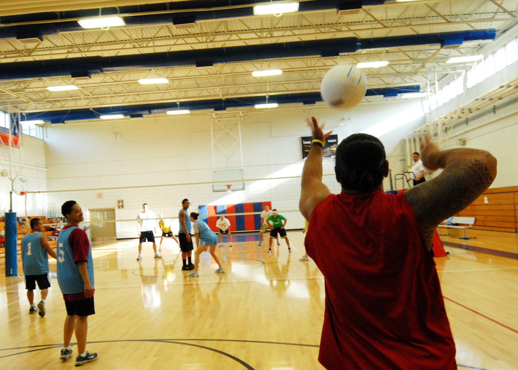 A player from the 96th Medical Group serves it up during the Eglin intramural volleyball championship May 13 at the fitness center.  The MDG team won easily in two games, although 308th Armament Systems Wing kept the games close.  The MDG team was undefeated in the playoffs.  (U.S. Air Force photo/Samuel King Jr.)
