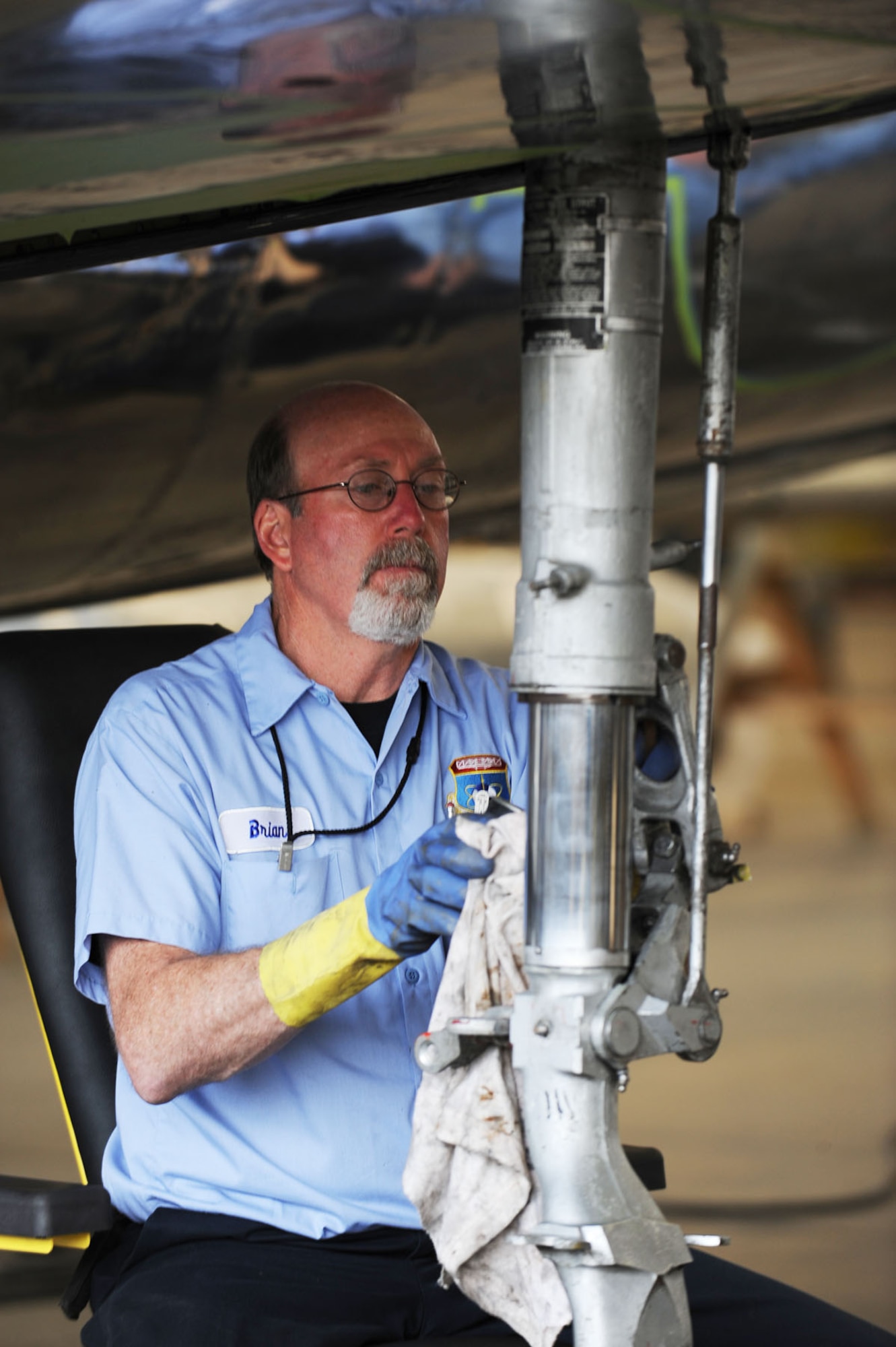 DAYTON, Ohio (04/2010) -- A restoration specialist works on the F-84 in the Restoration Hangar at the National Museum of the U.S. Air Force. (U.S. Air Force photo/Master Sgt. William Greer)