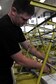 DAYTON, Ohio (04/2010) -- Restoration specialist Nick Almeter works on the B-17F &quot;Memphis Belle&quot; in the Restoration Hangar at the National Museum of the U.S. Air Force. (U.S. Air Force photo/Master Sgt. William Greer)