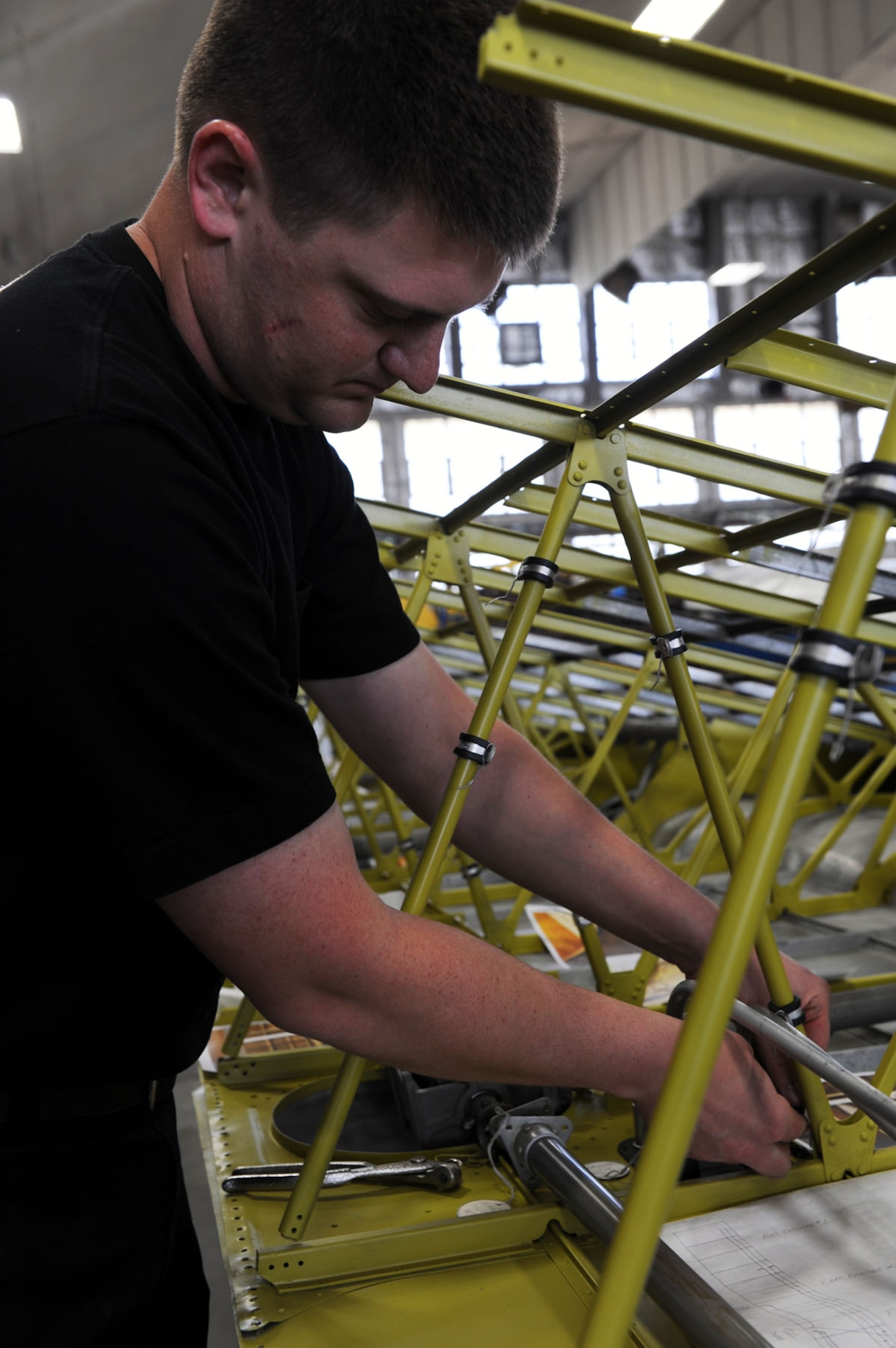 DAYTON, Ohio (04/2010) -- Restoration specialist Nick Almeter works on the B-17F "Memphis Belle" in the Restoration Hangar at the National Museum of the U.S. Air Force. (U.S. Air Force photo/Master Sgt. William Greer)