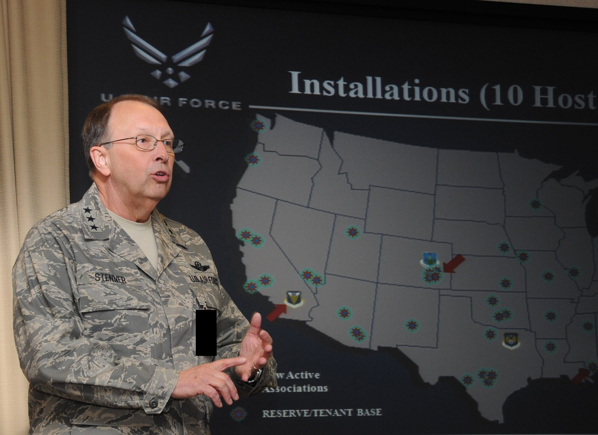 Lt. Gen. Charles Stenner, the Commander of the Air Force Reserve Command and Chief of the Air Force Reserve, briefs civic leaders and Honorary Commanders from MacDill Air Force Base, Fla., on Air Force Reserve missions and components during a civic leaders tour to Robins Air Force Base, Ga., May 13, 2010. (U.S. Air Force photo by Senior Airman Anna-Marie Wyant)