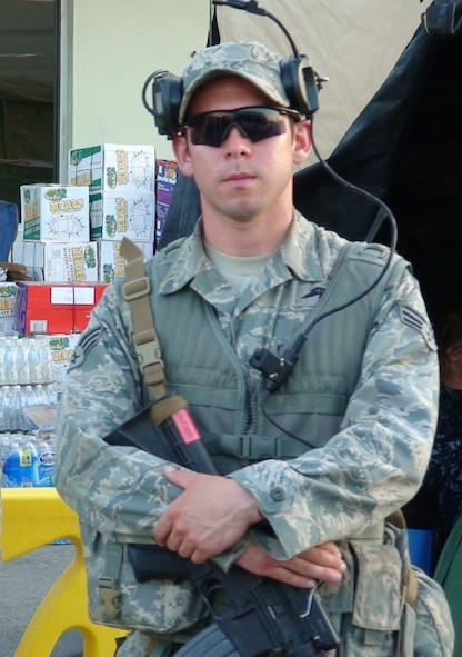 PORT-AU-PRINCE, Haiti -- Senior Airman Jason Mitchell, 823rd Expeditionary Security Forces Squadron fire team leader, provides security at the Toussaint L'Ouverture International Airport here in February. Providing security since January, Airman Mitchell has had the opportunity to see the resiliency of the Haitian citizens while they recovered from the earthquake. (Contributed photo/RELEASED)