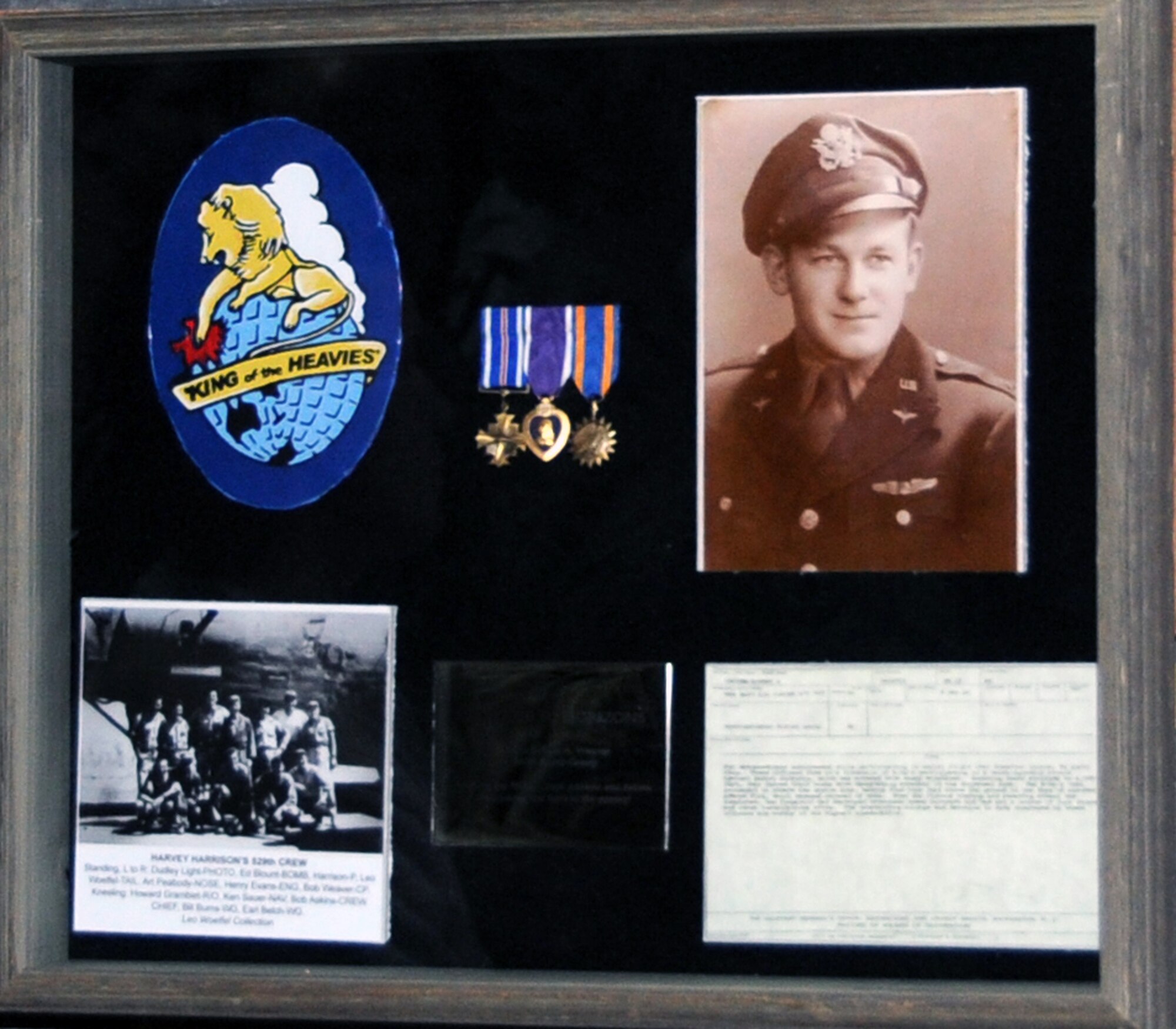 This is the shadow box created through the vision of Lt. Col. Daryl Page, 380th Expeditionary Operations Support Squadron commander, to honor retired Lt. Col. Robert Weaver, a former B-24 Liberator pilot during World War II with the 380th Bombardment Group, and others during a special presentation by Colonel Page and other 380th AEW members honoring 380th BMG veterans May 12, 2010, at non-disclosed base in Southwest Asia. (U.S. Air Force Photo/Senior Airman Jenifer H. Calhoun/Released)