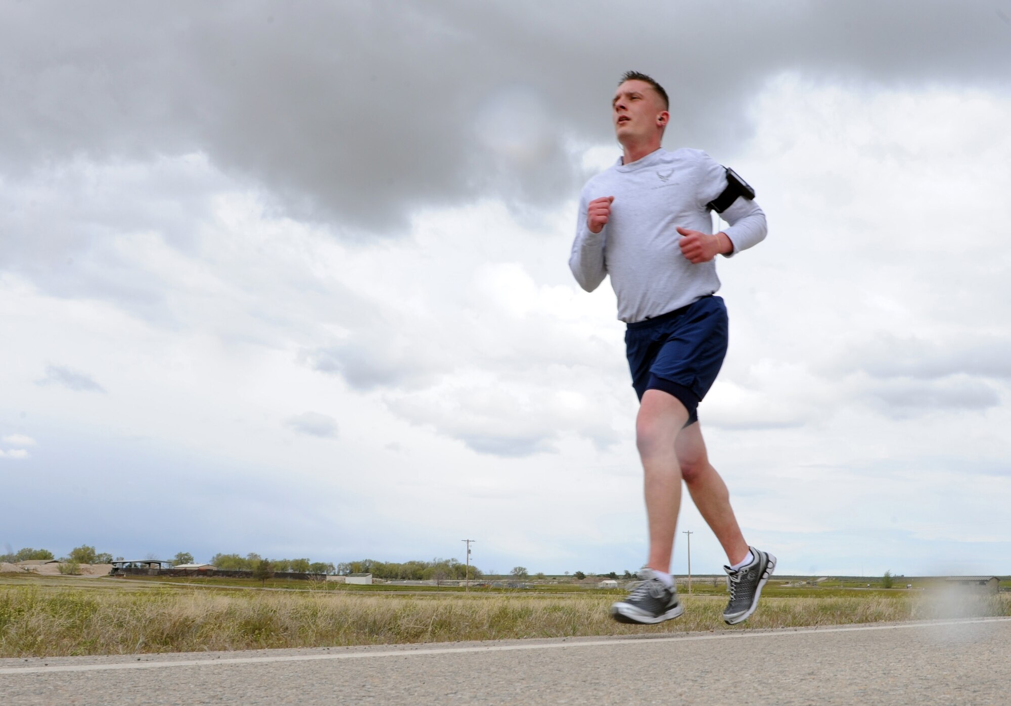 MOUNTAIN HOME AIR FORCE BASE, Idaho – Staff Sgt. Justin Morgan, 366th Security Forces Squadron K-9 handler, participates in a 5K run to celebrate National Police Week outside the Security Forces Squadron May 10. An average of 165 officers are killed in the line of duty each year which is approximately one every 53 hours. National Police week is a time to pay tribute to law enforcement officers who lost their lives in the line of duty for the safety and protection of others, according to the National Peace Officer's Memorial Fund website. (U.S. Air Force photo by Airman 1stClass Debbie Lockhart)