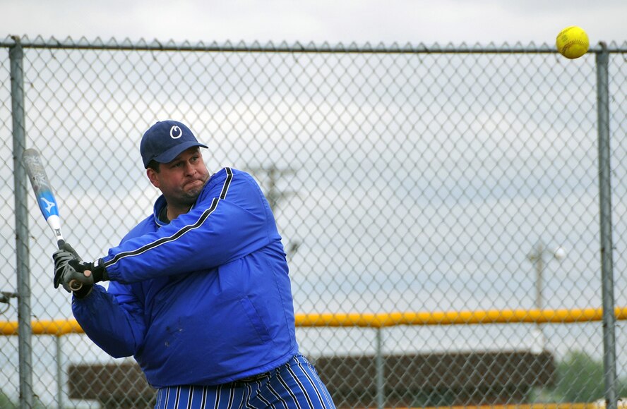 OFFUTT AIR FORCE BASE, Neb. -- Jason Bosiljevac, Omaha Police Department, prepares to hit the ball during Offutt's Police Week Softball Tournament here May 13. Mr. Bosiljevac is a member of the Omaha Heat, the OPD's softball team, which played the members of the 55th Security Forces Squadron's softball team in a double elimination tournament. The tournament was one of Offutt's many events in observance of National Police Week which also included a static weapons display, military working dog demonstration and a retreat ceremony. U.S. Air Force Photo by Jeff W. Gates.