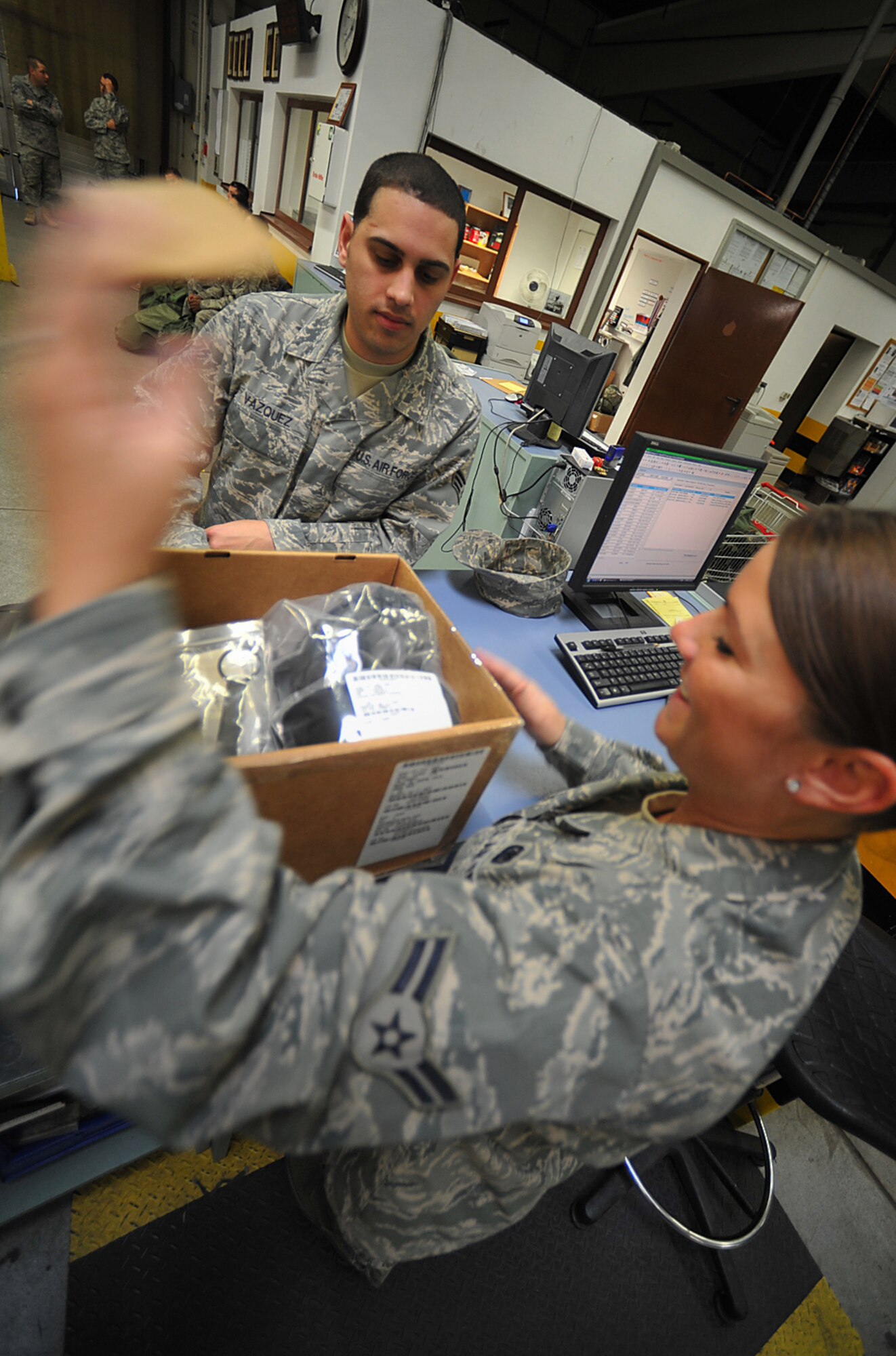 U.S. Air Force Airman 1st Class Misty Harpoon, 86th Logistics Readiness Squadron, helps Senior Airman Carlos Vazquez, 86th Services Squadron, inventory his new M50 chemical and biological gas mask at the 86th Logistics Readiness Squadron’s individual protective equipment facility, Ramstein Air Base, Germany, May 17, 2010. Many Airmen have visited the facility to exchange their outdated gear in preparation for the upcoming Operational Readiness Inspection. (U.S. Air Force photo by Senior Airman Tony R. Ritter)