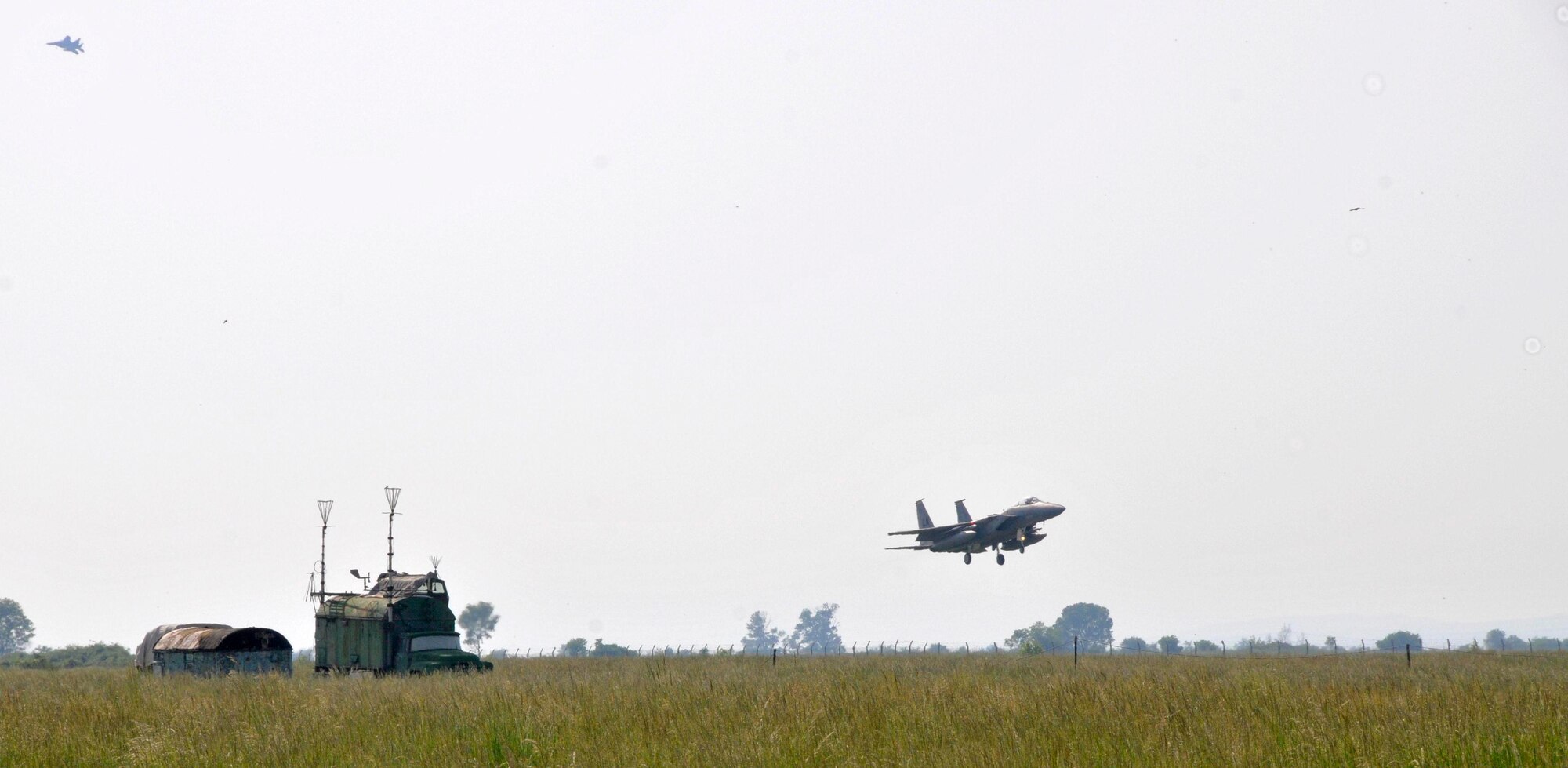 GRAF IGNATIEVO AIR FORCE BASE, Bulgaria - An F-15 from the 493rd Fighter Squadron at RAF Lakenheath, England, lands at Graf Ignatievo Air Force Base in Plovdiv, Bulgaria, May 13, Airmen from the 48th Fighter Wing are in Bulgaria taking part in Sentry Gold, an exercise developed to familiarize U.S. pilots with the MiG airframes, build partnerships with the Bulgarian air force and assist them in their continued integration into NATO operations.