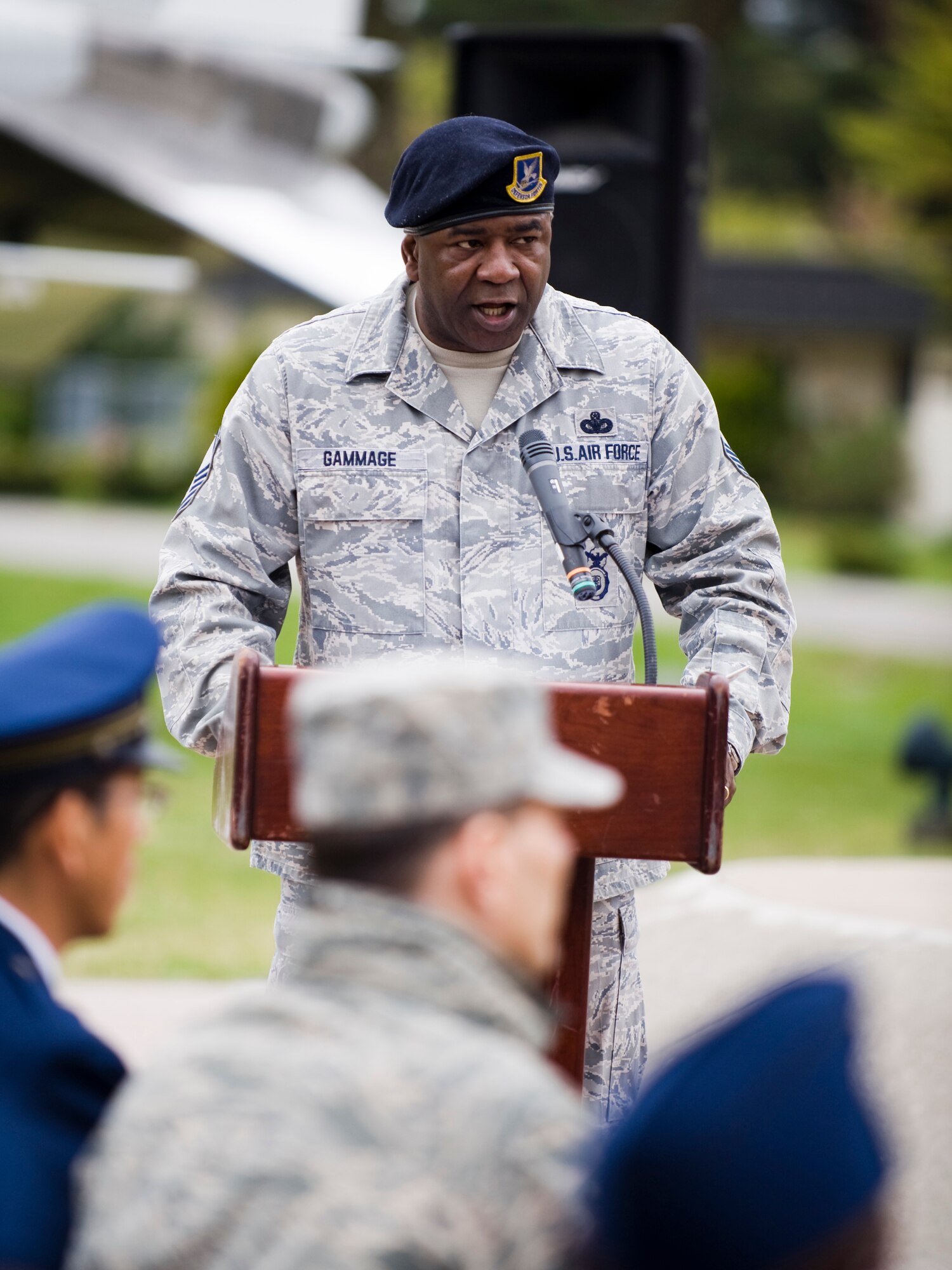 MISAWA AIR BASE, Japan -- Chief Master Sgt. John Gammage, 35th Security Forces Squadron manager, gives remarks during a National Police Week retreat ceremony May 14 at Risner Circle. National Police Week is designated to honor fallen law enforcement officers and service members. During the speech, Chief Gammage spoke on the sacrifices of Japanese police officer, Kunihiko Miyamoto, U.S. Navy Seal Petty Officer 2nd Class Michael Anthony Monsoor and Air Force security forces Staff Sergeant John T. Self. (U.S. Air Force photo/Senior Airman Jamal D. Sutter)