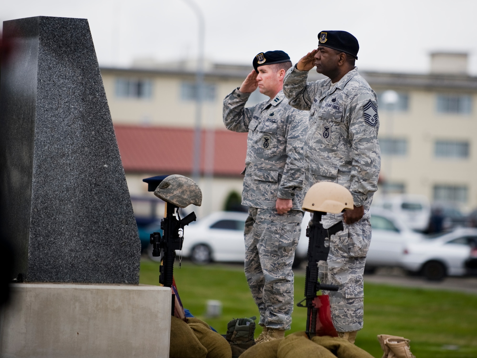 MISAWA AIR BASE, Japan -- Capt. Leo Martin, 35th Security Forces Squadron commander, and Chief Master Sgt. John Gammage, 35th SFS manager, take part in a retreat ceremony to wrap up National Police Week May 14 at Risner Circle. National Police Week is designated to honor fallen law enforcement officers and service members. (U.S. Air Force photo/Senior Airman Jamal D. Sutter)