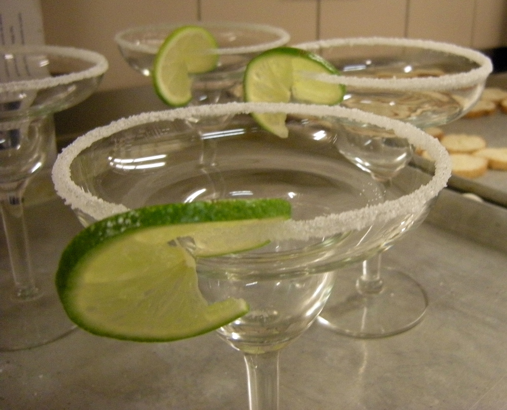 SPANGDAHLEM AIR BASE, Germany – Margarita glasses dipped in salt and garnished with sliced lime wedges were among the decked-out dishes prepared by the dining facility chefs during the Ultimate Chef Showdown at Club Eifel May 13. The dining facility team prepared a three-course Mexican meal for the judges, while Club Eifel served Italian fare. Both teams were judged based on a variety of criteria, including presentation. The overall winner was Club Eifel, while the dining facility was commended for having the best appetizer and dessert.   (U.S. Air Force photo/2nd Lt. Kathleen Polesnak)