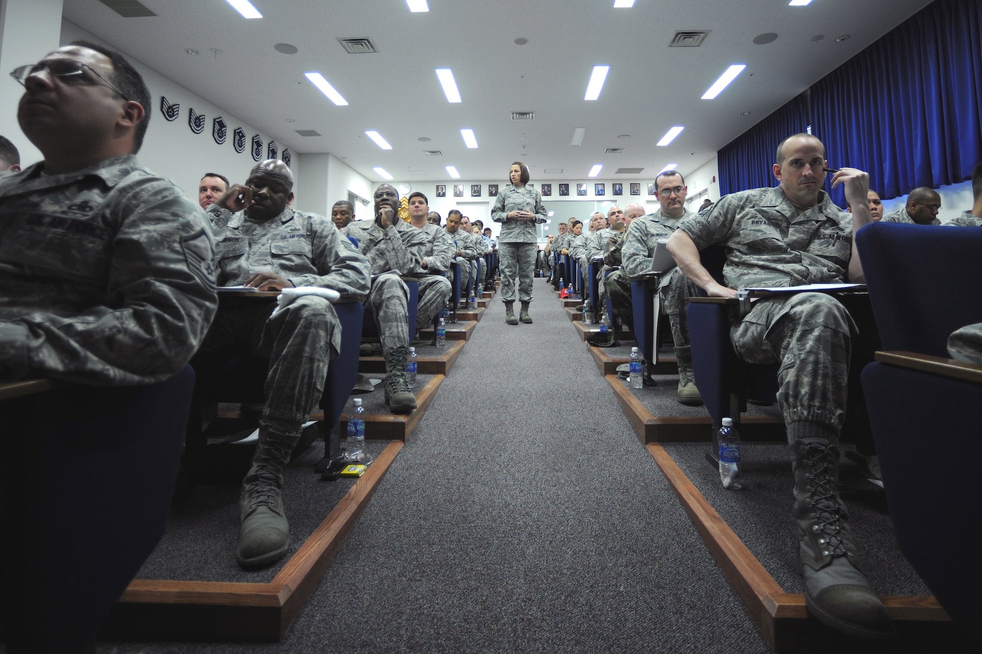 YOKOTA AIR BASE, Japan -- Master Sgt. Melanie Noel, Air Force First Sergeant Academy instructor, prepares 99 enlisted leaders from around Japan to better care for their Airmen during the Additional Duty First Sergeant Seminar here May 11-14. The five day seminar covered topics including financial responsibilities, administrative actions and suicide prevention. (U.S. Air Force photo/Osakabe Yasuo)