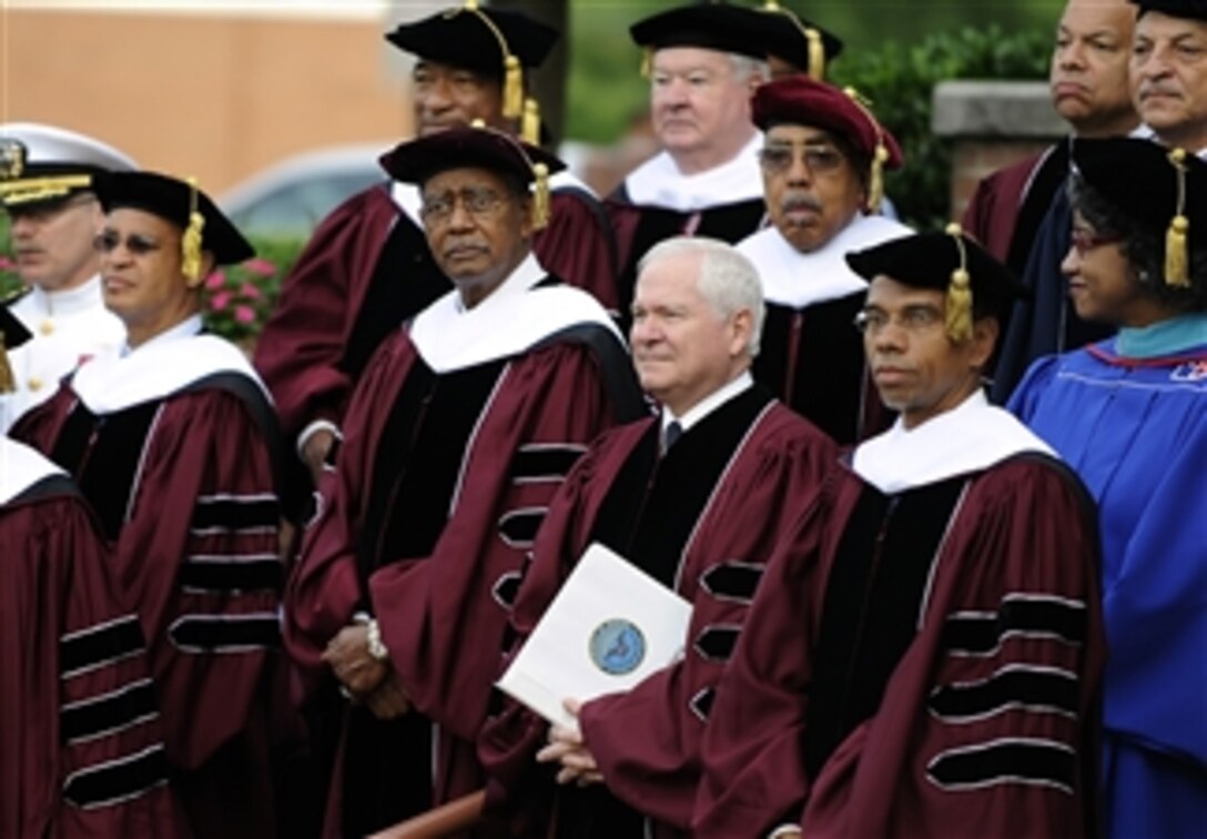 Secretary of Defense Robert M. Gates stands with faculty members of Morehouse College in Atlanta, Ga., during the college's 126th Commencement ceremony on May 16, 2010.  