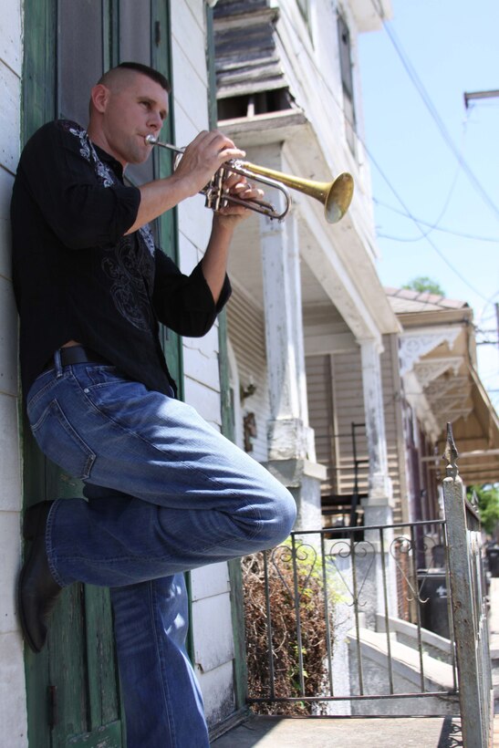 Gunnery Sgt. Duane King plays his trumpet in the Bywater neighborhood of New Orleans. King has served ten years of his career with the New Orleans based Marine Forces Reserve Band. He will depart New Orleans late June for his next assignment with the President's Own Band.