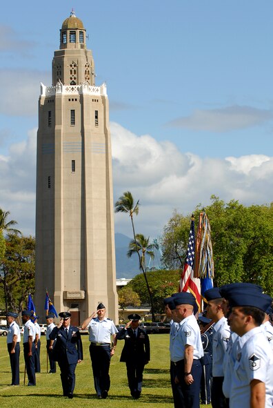 JOINT BASE PEARL HARBOR HICKAM, Hawaii -- Col. Sam Barrett, Col. Andrew Hockman and Col. Giovanni Tuck do a review of the troops during the change of command ceremony May 18. Lt. Gen. Hawk Carlisle, 13th Air Force commander, presided over the 15th Wing change of command where Colonel Barrett assumed command from Colonel Tuck. The change of command also included a re-designation from the 15th Airlift Wing to the 15th Wing. The re-designation reflects the mission change of the 15th Wing that will activate an active duty F-22 squadron and KC-135 squadron this summer. (U.S. Air Force photo/Staff Sgt. Mike Meares)