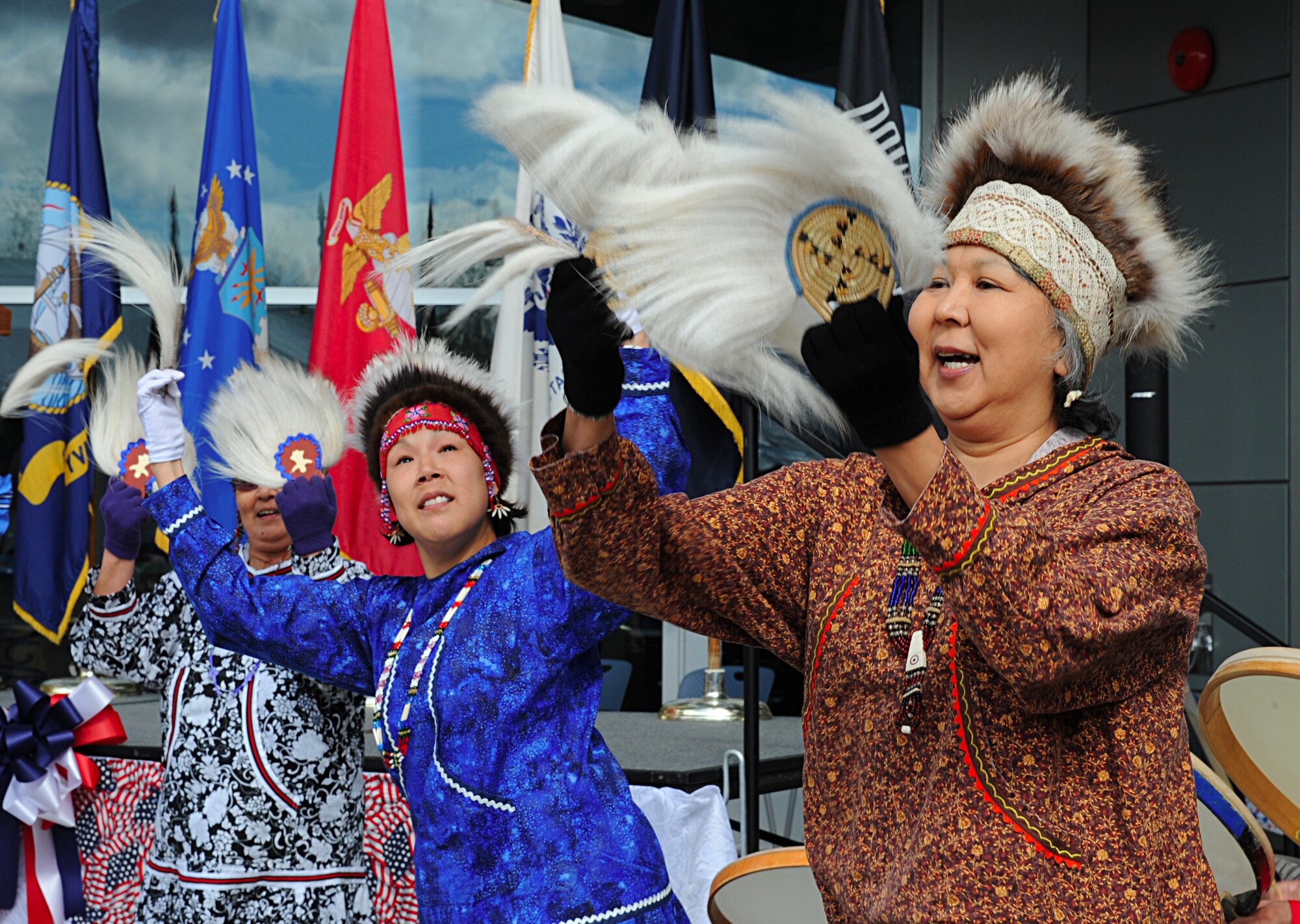 ANCHORAGE, Alaska -- Kicaput singers and dancers perform purification and honor songs at the ribbon cutting ceremony of the Anchorage VA Outpatient Clinic and Anchorage Regional Office May 15. Civic leaders, Veterans Affairs personnel and military leaders gathered to celebrate the opening of this $76.1 million, 184,000 square-foot facility. (Air Force photo by Senior Airman Cynthia Spalding)