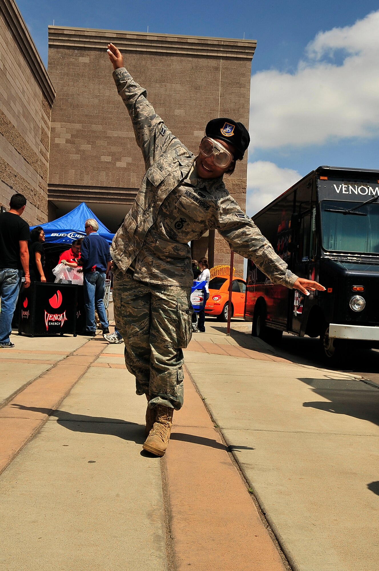 BUCKLEY AIR FORCE BASE, Colo. -- Airman 1st Class Acquah Hill, 460th Security Forces Squadron, demonstrates the effects of alcohol and drug use by wearing "fatal vision" goggles during National Police Week here, May 14. (U.S. Air Force photo by Staff Sgt. Kathrine McDowell)
