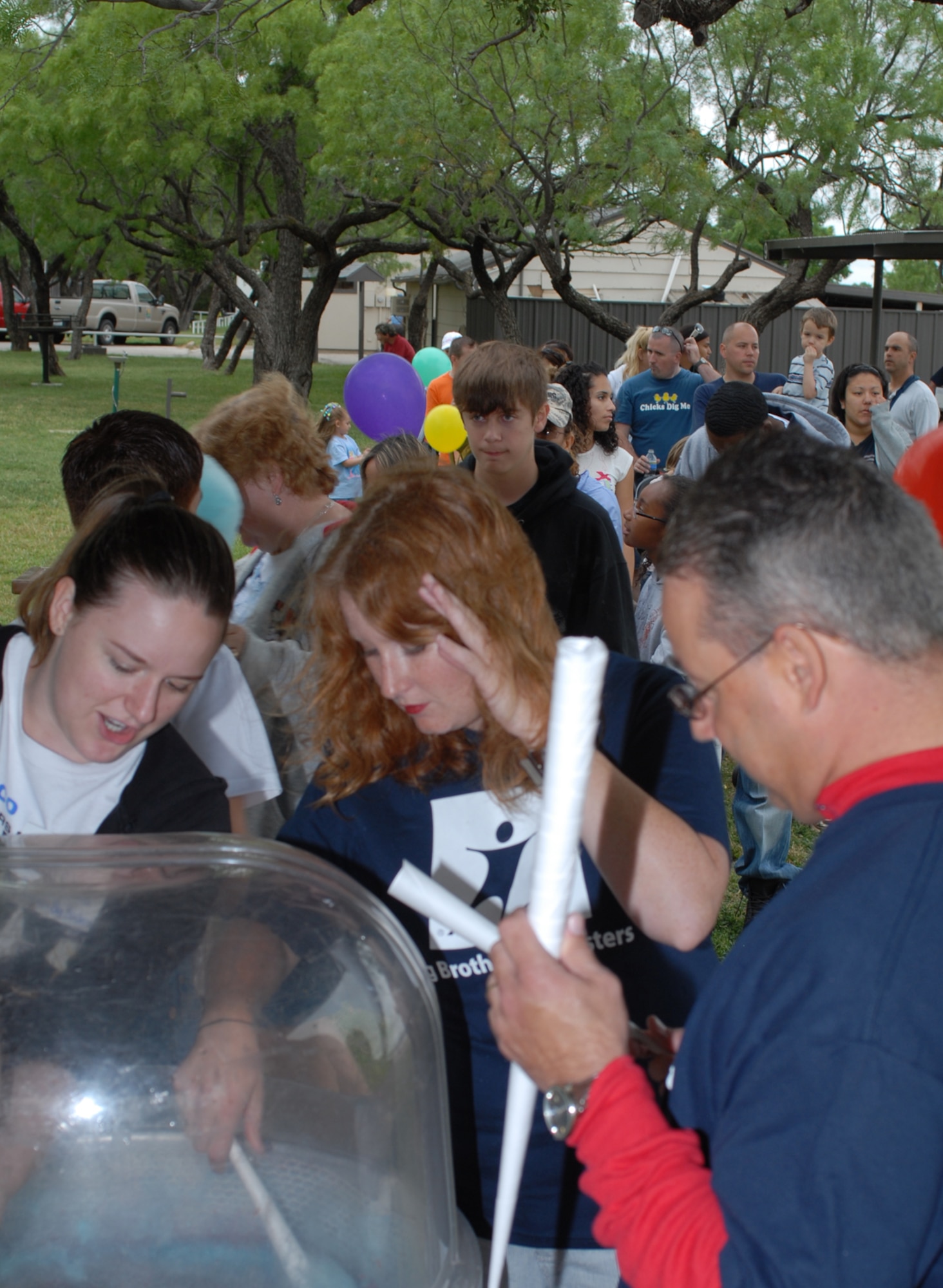 SAN ANGELO, Texas -- Volunteers prepare cotton candy for Goodfellow Air Force Base servicemembers and their families during the 5th Annual Military Appreciation Day, May 15, 2010. The event, held at the Goodfellow Air Force Base Recreation Camp, was hosted by the San Angelo Chamber of Commerce. More than 2600 people attended the event. (U.S. Air Force photo/Staff Sgt. Laura R. McFarlane)


