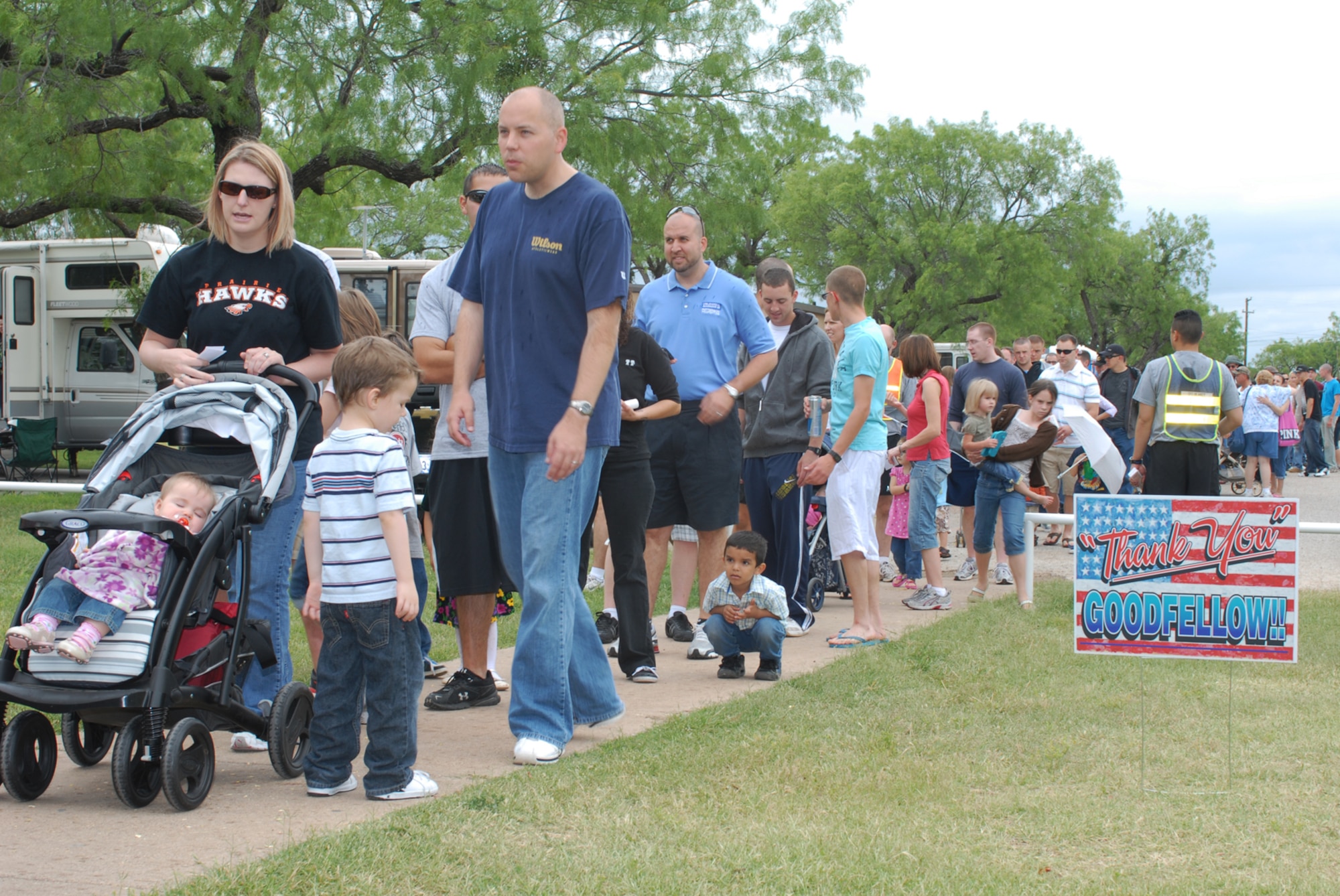 SAN ANGELO, Texas -- Goodfellow Air Force Base servicemembers and their families stand in line for lunch during the 5th Annual Military Appreciation Day, May 15, 2010. The event, held at the Goodfellow Air Force Base Recreation Camp, was hosted by the San Angelo Chamber of Commerce. More than 2600 people attended the event. (U.S. Air Force photo/Staff Sgt. Laura R. McFarlane)

