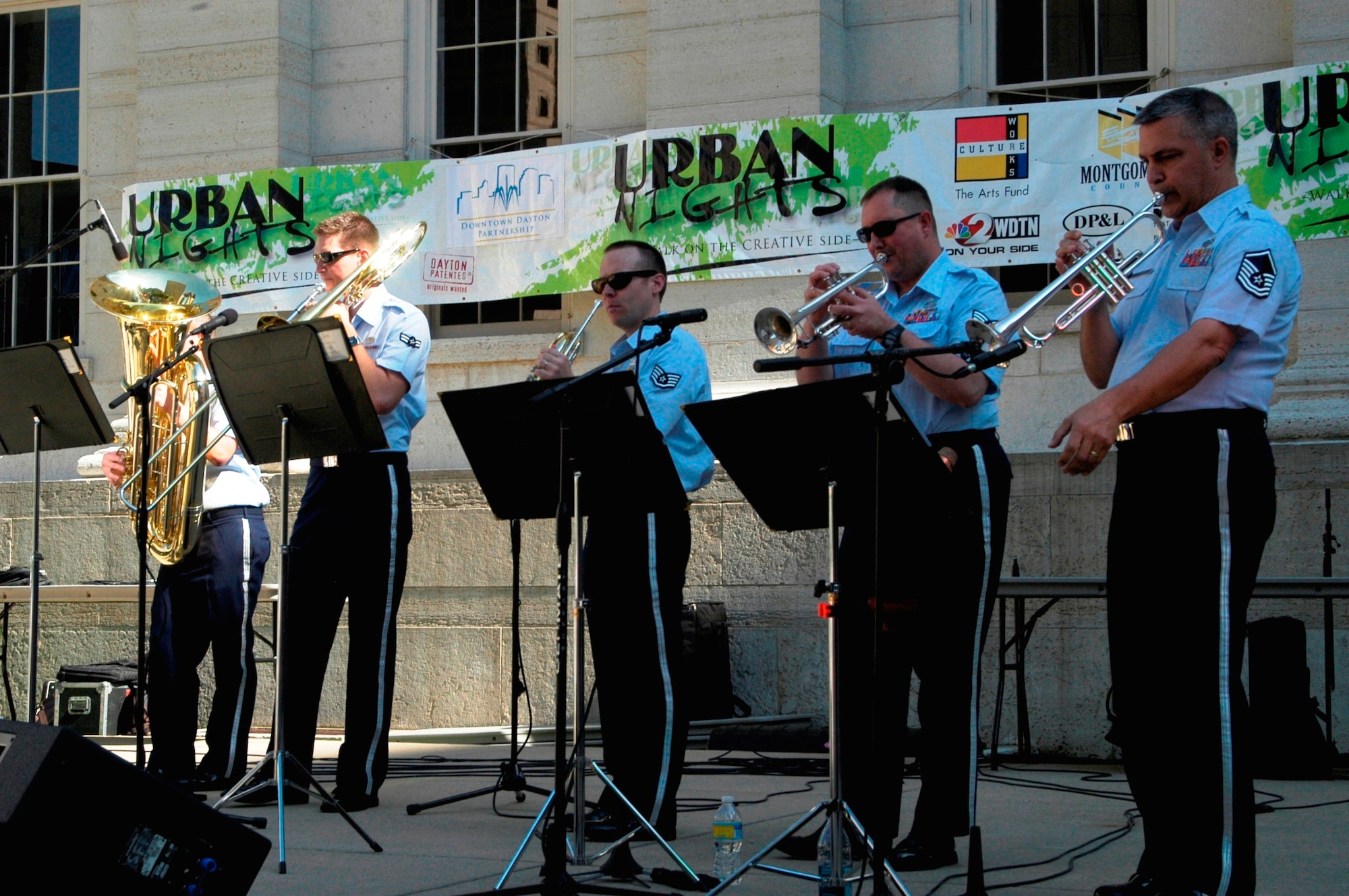 The five piece brass section of the New Harmony band from Wright-Patterson AFB, Ohio, played a popular tune “Brick House” by the Commodores at Dayton’s Urban Nights on May 14 in Downtown Dayton. (U.S. Air Force Photo by Ted Theopolos)