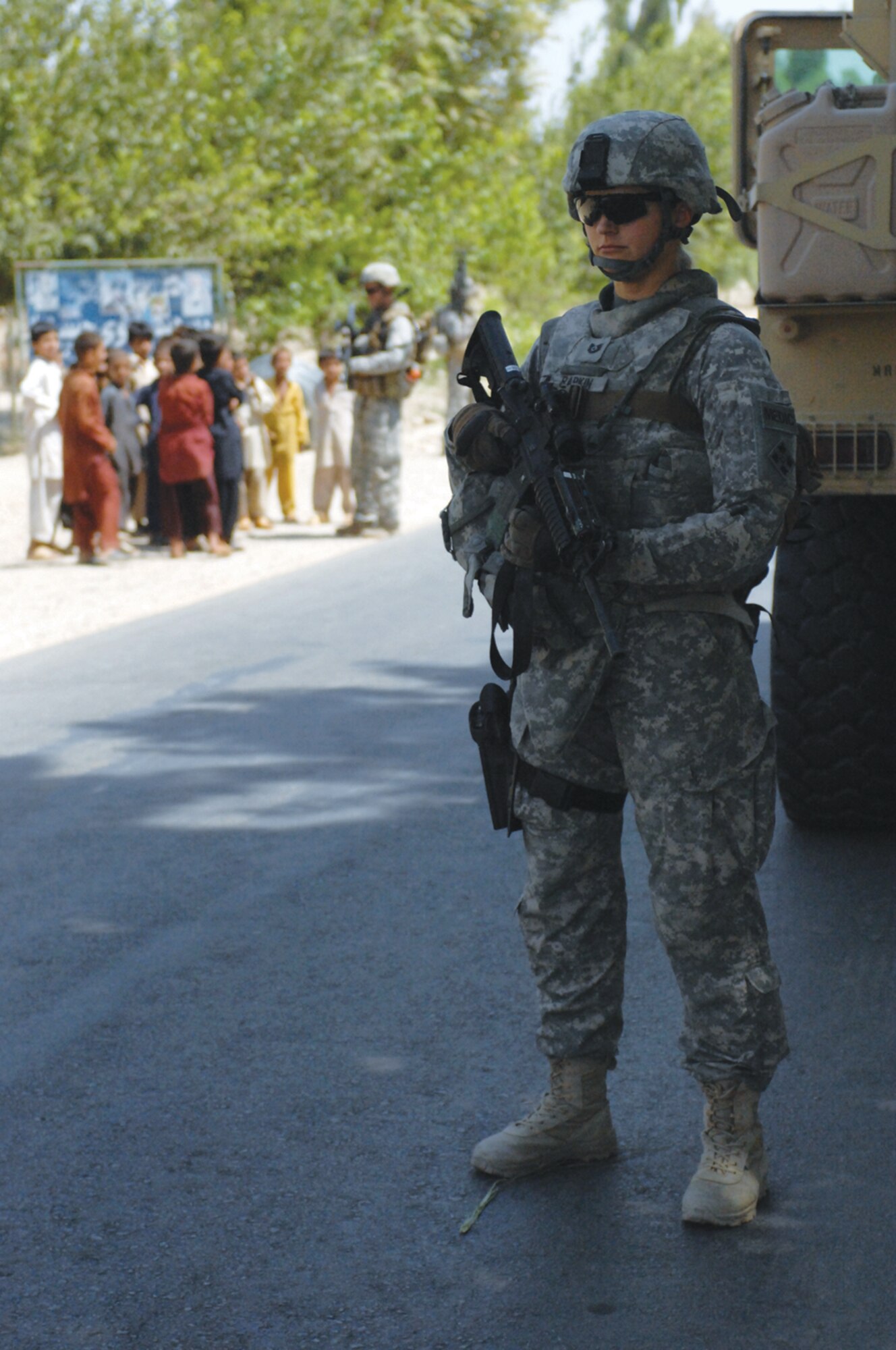 LAGHAM PROVINCE, Afghanistan - Tech. Sgt. Gloria Rapkin Laghman Provincial Reconstruction Team aerospace medical technician, pulls security while on a convoy mission during her recent year-long deployment. Sergeant Rapkin was deployed from the 509th Medical Group at Whiteman Air Force Base, Mo.