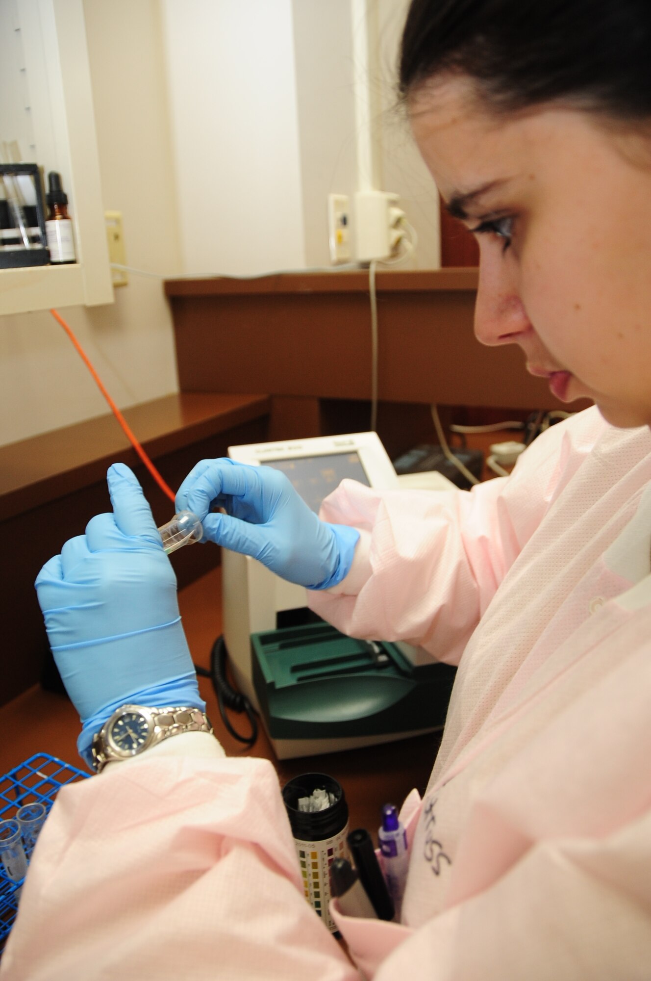 ELLSWORTH AIR FORCE BASE, S.D. -- Staff Sgt. Danielle Struss, 28th Medical Group lab technician, conducts quality assurance tests on a urine analysis machine, May 18.  Quality assurance tests are conducted on a daily basis. (U.S. Air Force photo/Airman 1st Class Anthony Sanchelli)