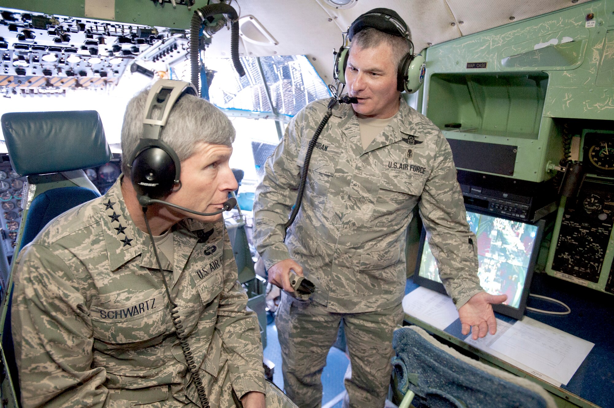 Air Force Chief of Staff Gen. Norton Schwartz listens as Senior Master Sgt. Scott Curran, superintendent of international and expeditionary education and training at the U.S. Air Force School of Aerospace Medicine, explains the mission scenarios and emergency procedures taught in the C-130 Hercules simulators to better prepare aircrews responsible for the medical evacuation of patients. General Schwartz was visiting the school May 13, 2010, at Brooks City-Base in San Antonio.  (U.S. Air Force photo/Steve Thurow)