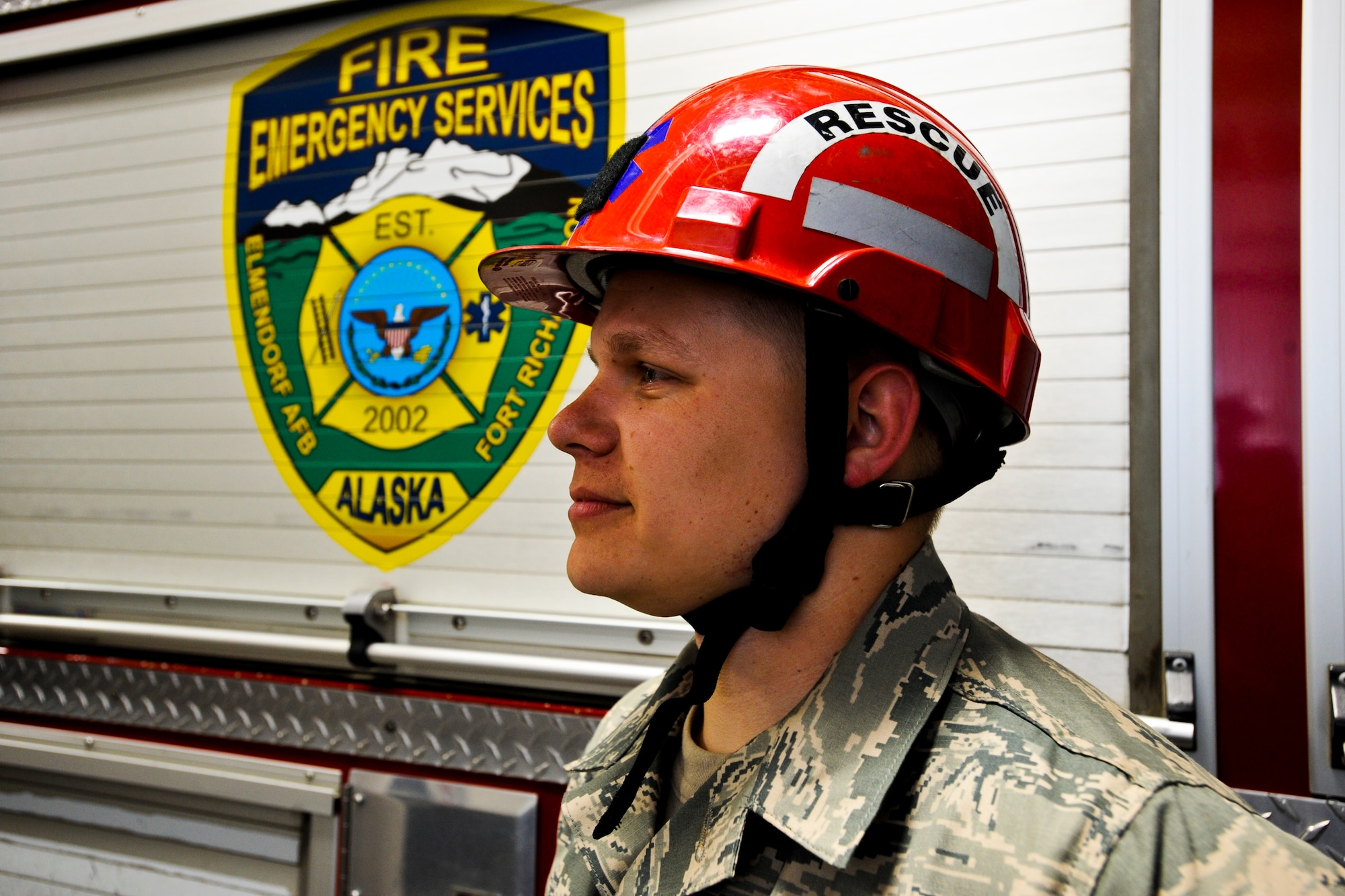 ELMENDORF AIR FORCE BASE, Alaska – Staff Sgt. Scott Strobel, 3rd Civil Engineer Squadron rescue crew chief, listens attentively during a training exercise May 13. Elmendorf fire protection specialists participate in training daily to keep prepared for worst-case scenarios. (Air Force photo by Airman 1st Class Jack Sanders)
