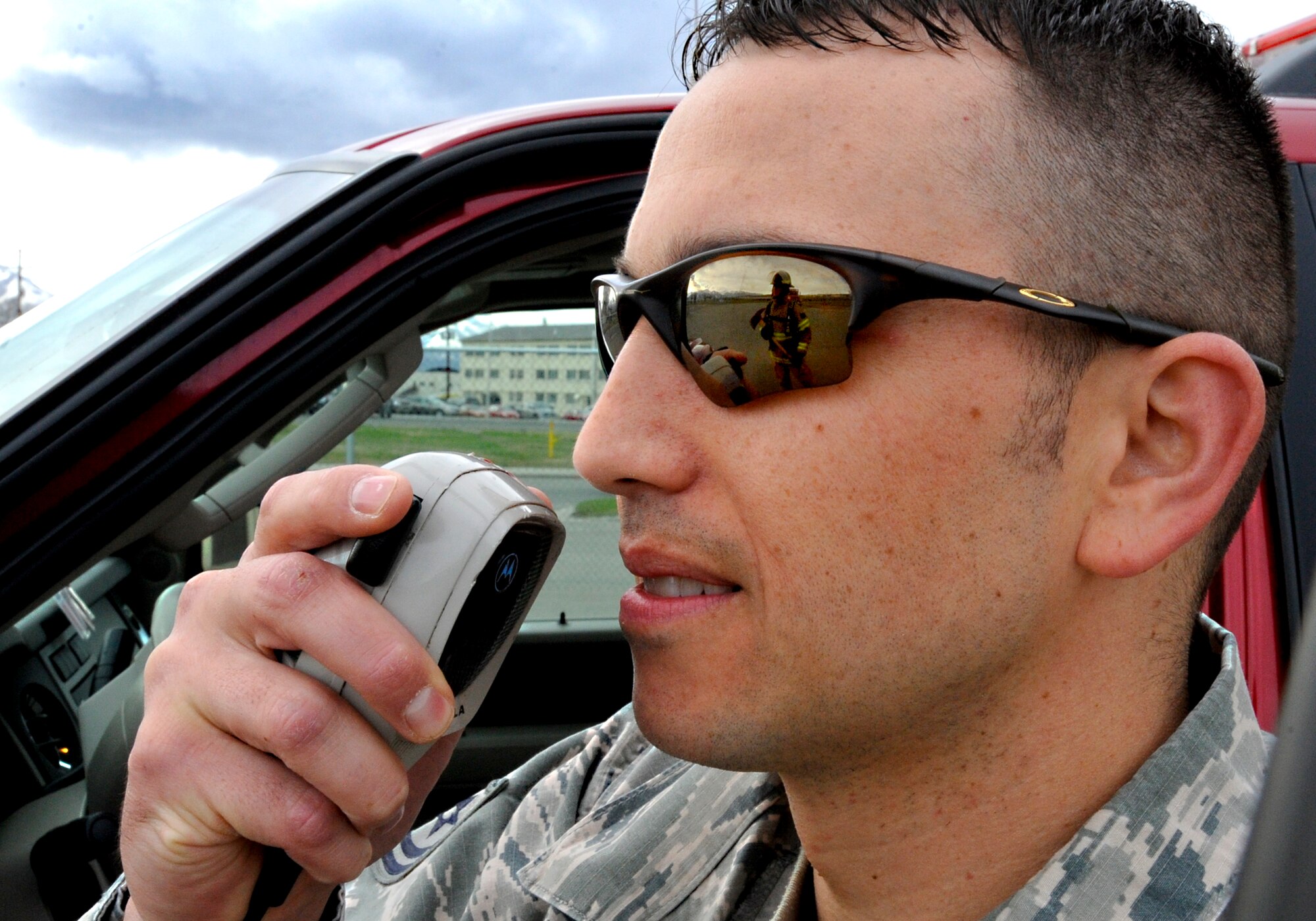 ELMENDORF AIR FORCE BASE, Alaska – Tech. Sgt. Rikk Matteson, 3rd Civil Engineer Squadron A Shift battalion chief, gives instruction over the radio to fire protection team members during a daily training exercise May 13. Elmendorf fire protection specialists participate in training daily to keep prepared for worst-case scenarios. (Air Force photo by Airman 1st Class Jack Sanders)