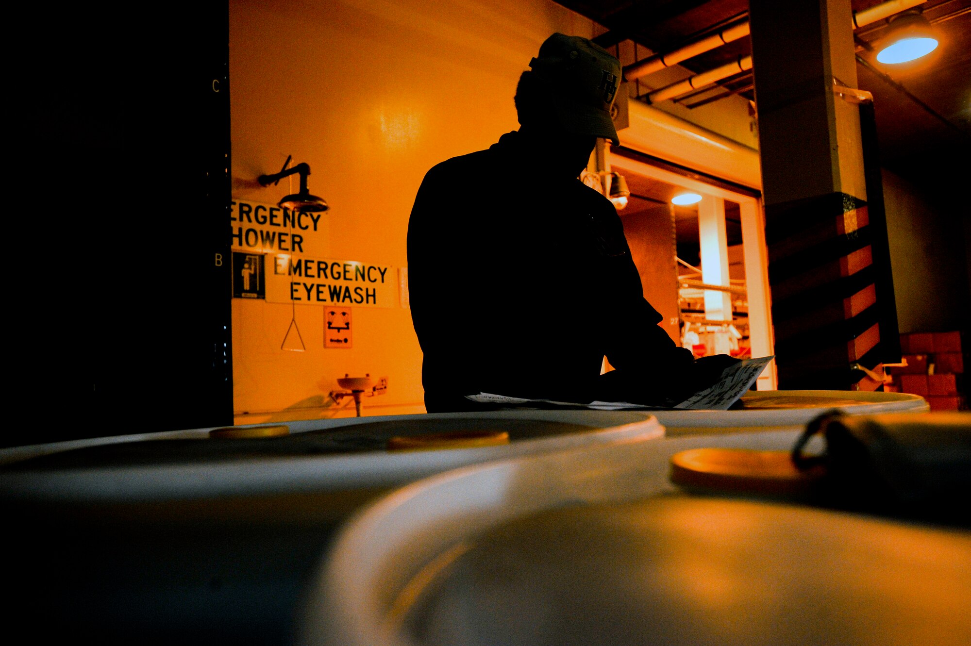 ELMENDORF AIR FORCE BASE, Alaska – Mr. Alfred McCarthy, 3rd Logistics Readiness Squadron Hazardous Material warehouse specialist, checks HAZMAT inventory stored at the warehouse May 12. The warehouse holds all hazardous material at Elmendorf. (Air Force photo by Airman 1st Class Jack Sanders)
