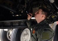 MINOT AIR FORCE BASE, N.D. -- Capt. Adam Roberts, 23rd Bomb Squadron instructor pilot, conducts a preflight check on a B-52H Stratofortress prior to a training sortie here May 11. Members from the 23rd BS are training in preparation for an upcoming deployment this summer. The checks are crucial to the successful launch of the aircraft and key to ensuring there are no issues with the instrumentation prior to takeoff. (U.S. Air Force photo by Airman 1st Class Aaron-Forrest Wainwright)