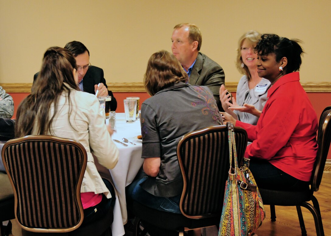 Niagara Falls Air Reserve 914th Airlift Wing Commander Allan Swartzmiller welcomes members of the HRDC to an ice-breaker reception at the Falcon Club, May 17, 2010, Niagara Falls, NY. Guests were treated to local Buffalo fare such as chicken wings, roast beef on weck rolls and NY Style cheesecake. (U.S. Air Force photo by Staff Sgt. Joseph McKee)