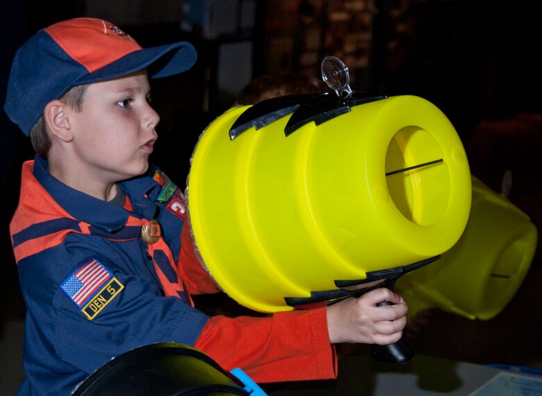 DAYTON, Ohio -- Young visitors participate in aerospace demonstration stations during Family Day at the National Museum of the United States Air Force. (U.S. Air Force photo)