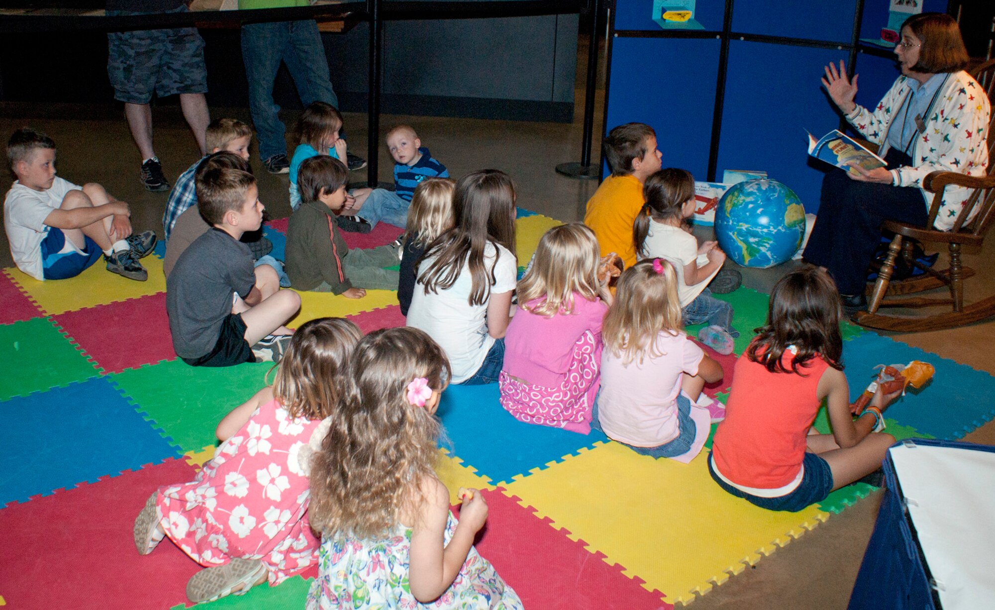 DAYTON, Ohio -- Aerospace educator Judith Wehn reads a story to young visitors during Family Day at the National Museum of the United States Air Force. (U.S. Air Force photo)