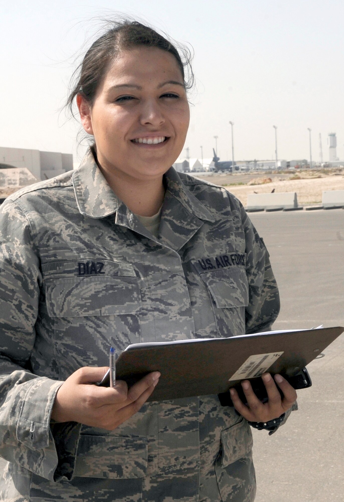 Senior Airman Anita Diaz is an air transportation journeyman with the 380th Expeditionary Logistics Readiness Squadron's Air Terminal Operations Center supporting operations for the 380th Air Expeditionary Wing at a non-disclosed base in Southwest Asia. Airman Diaz is deployed from the 89th Aerial Port Squadron at Joint Base Andrews, Md., and her hometown is Merced, Calif. (U.S. Air Force Photo/Capt. Cathleen Snow/Released)