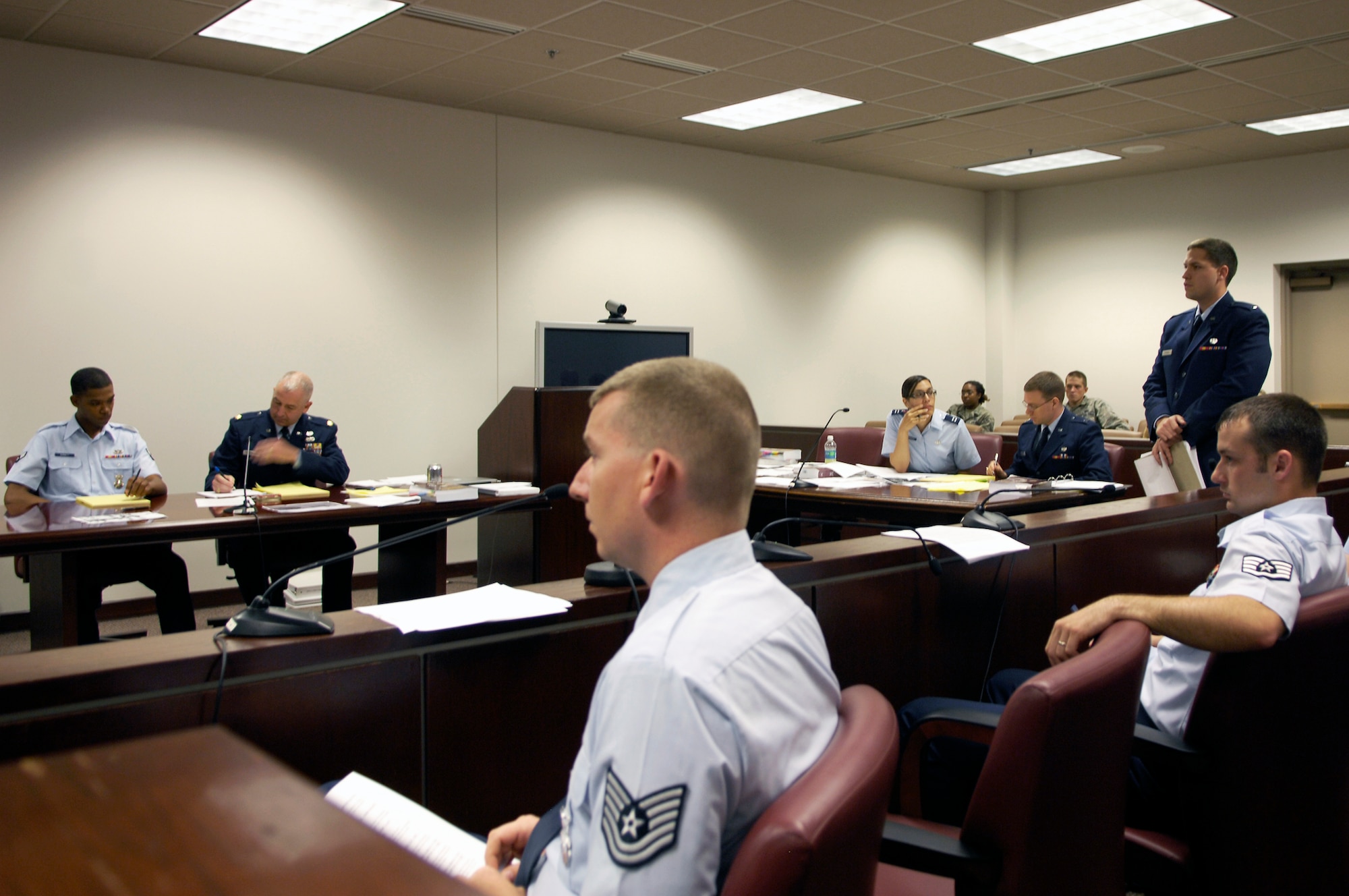 WHITEMAN AIR FORCE BASE, Mo. - Members of the 509th Security Forces Squadron and the 509th Bomb Wing Legal Office listen to witnesses testimony May 13 during a simulated trial. The two sections conducted a week-long exercise to show how each operated. (U.S. Air force photo/Staff Sgt. Jason Barebo)